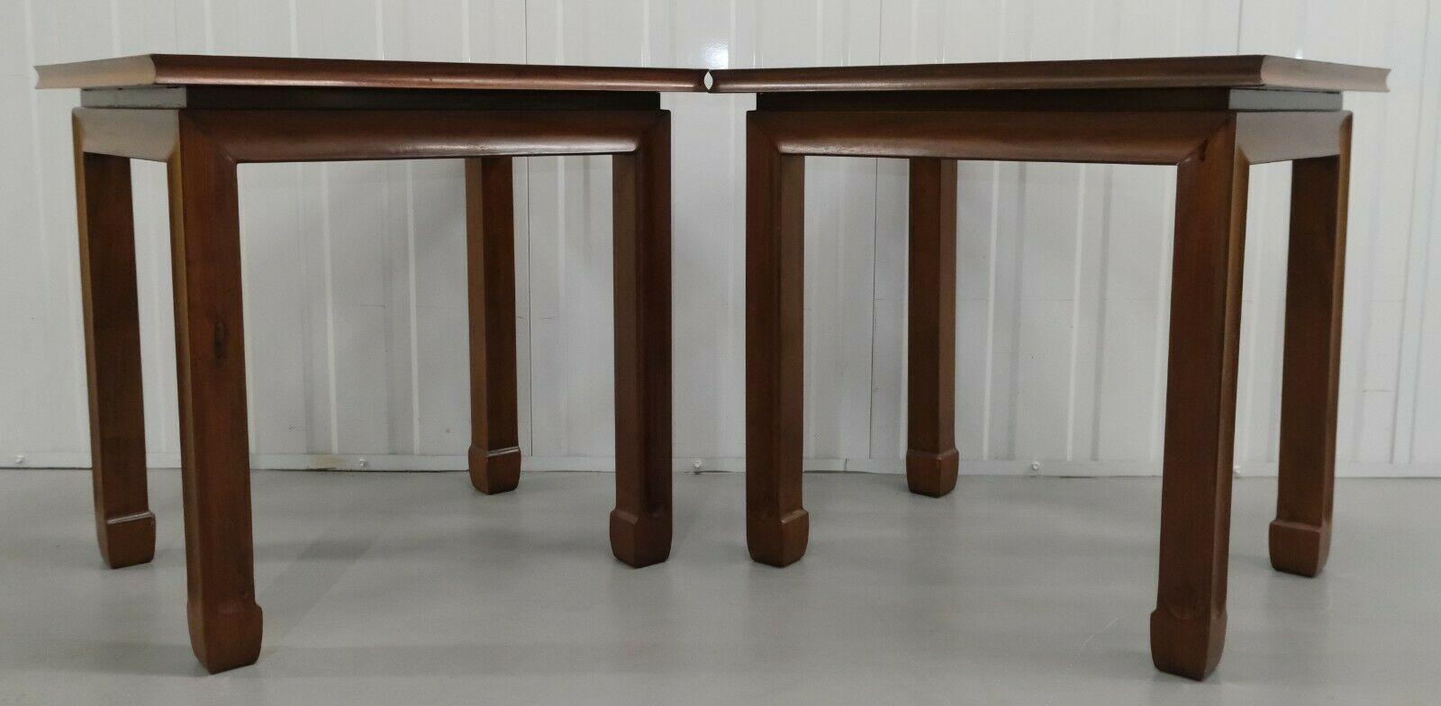 We are delighted to offer for sale this lovely pair of Chinese hardwood glass top occasional side tables.

The bevelled plate glass is placed on a beautiful latticework tops, giving them a very attractive and decorative figure that can be suitable