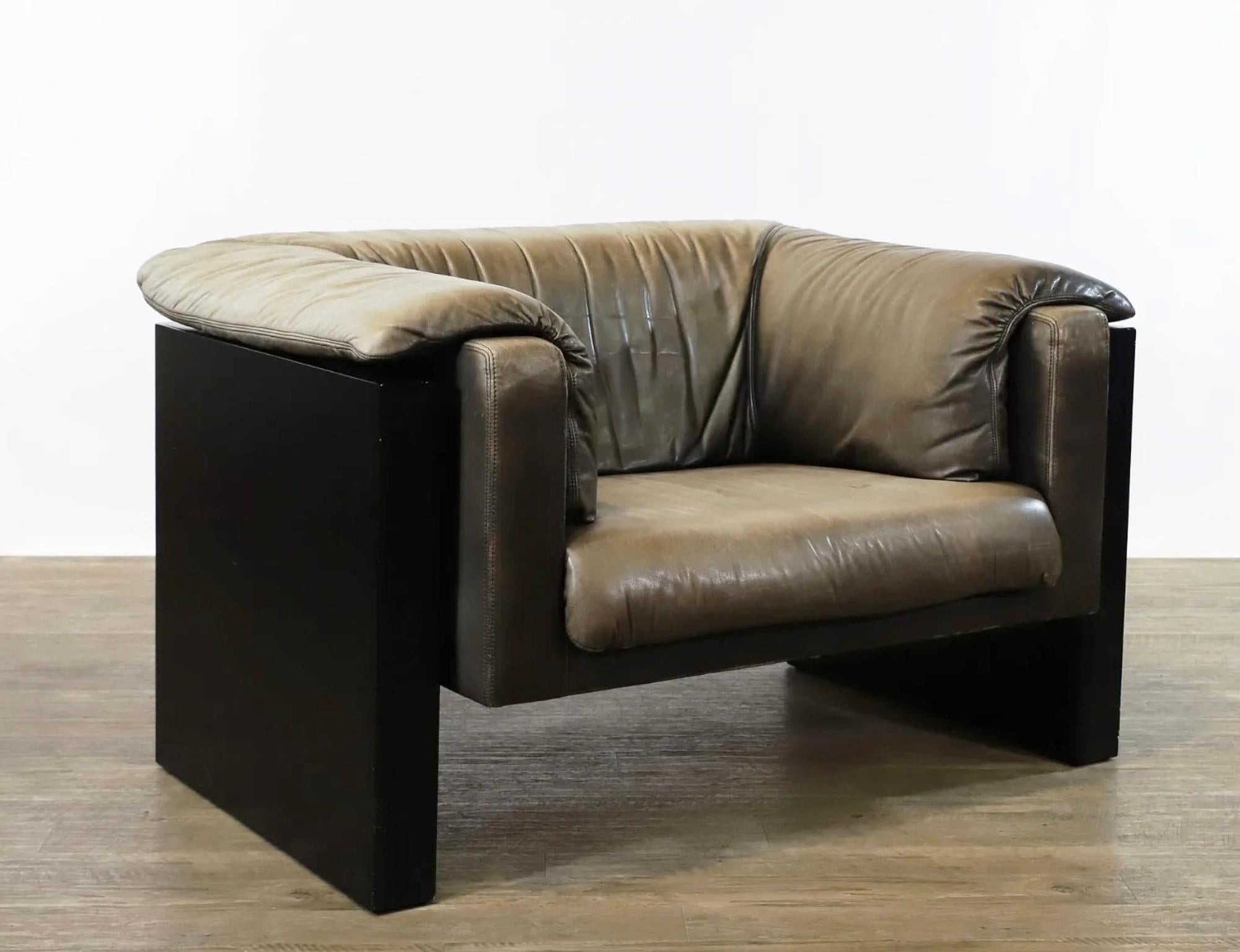 Pair of Lovely midcentury Post Modern German wide Leather Lounge Chairs. Floating lounge chairs sits Black lacquered wooden supports. Designed by Burkhard Vogtherr for HAIN & THOME. Very Unique black and gray ombre leather upholstery. Very Wide