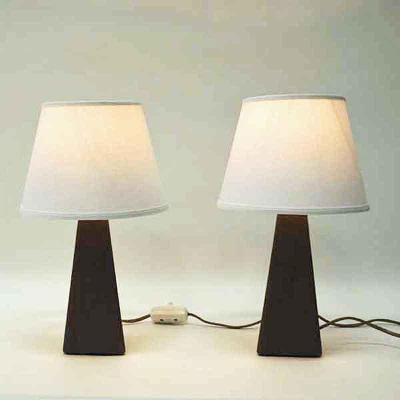 Nordic and special triangle shaped pair of table lamps covered in brown leatherette. From circa 1950s. Beautiful together or as single. On a table or in the window. White bulb base and brown matching cords. The white lampshades are included. Good