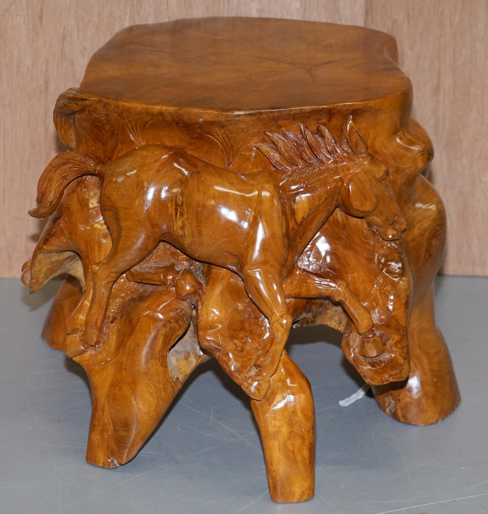 We are delighted to offer for sale this lovely one of a kind pair of hand carved Equestrian Galloping Horse Root wood carved side tables 

These tables are part of a suite, I have another pair of these side tables and a matching very large coffee