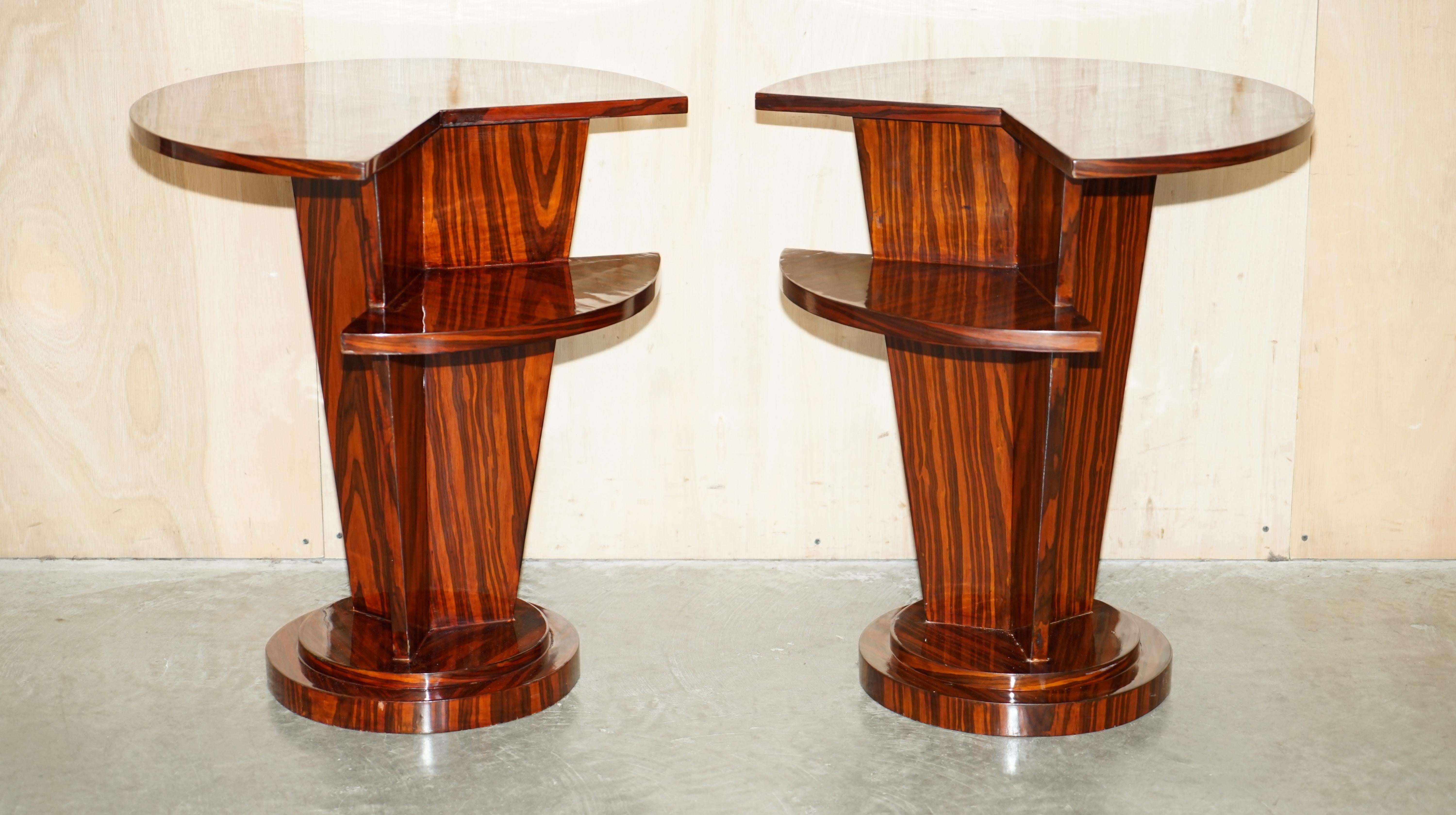 We are delighted to offer for sale this lovely pair of vintage Art Deco style Macassar two tier side end lamp wine tables 

A very good looking and highly decorative pair of side tables, they are two tier tables with a nice Macassar finish to