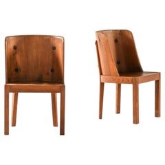 Par de sillones Lovö de pino y hierro forjado, diseñados por Axel Einar Hjorth, 1932