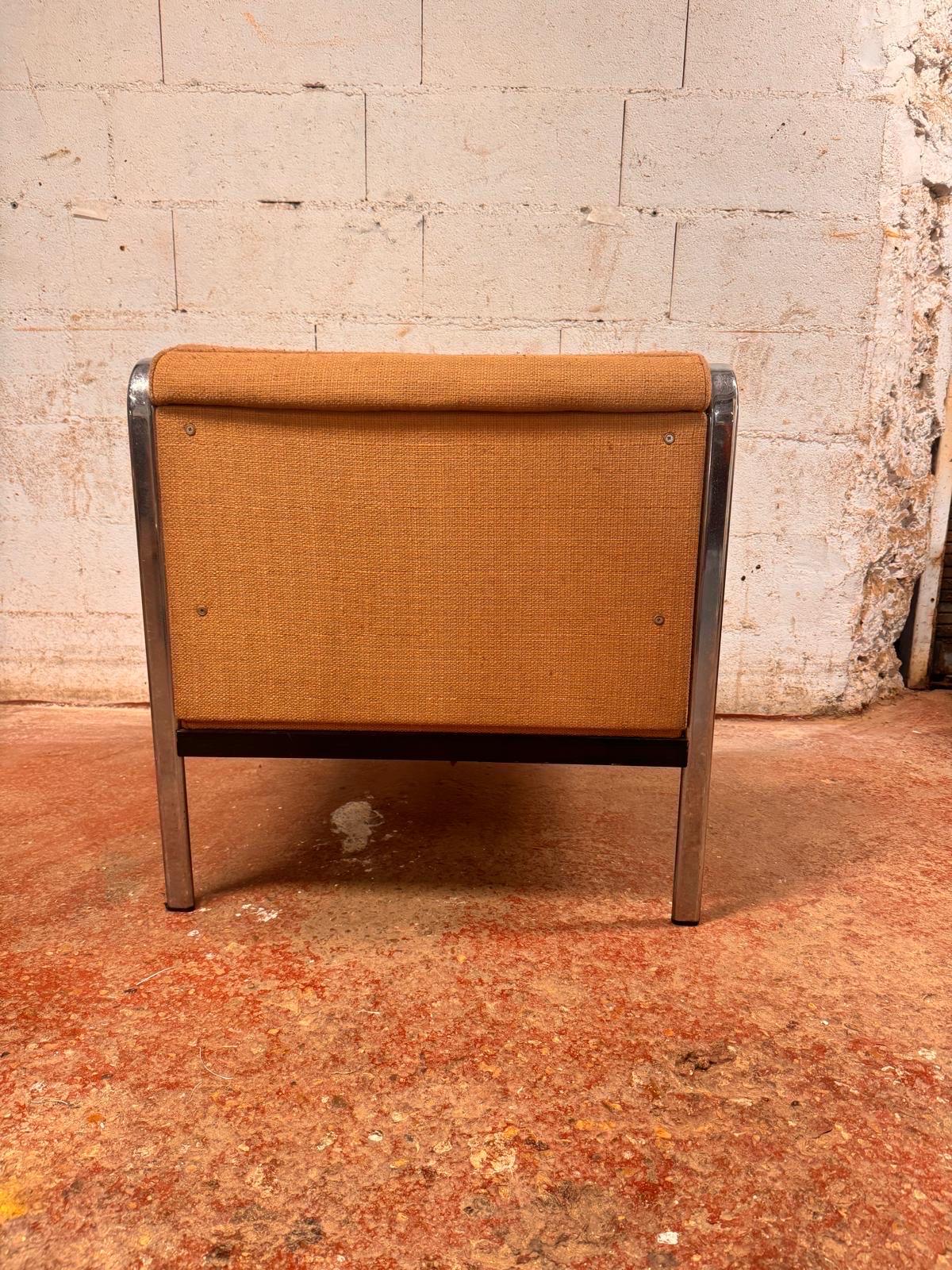 Pair of chrome and fabric low armchairs by airborne