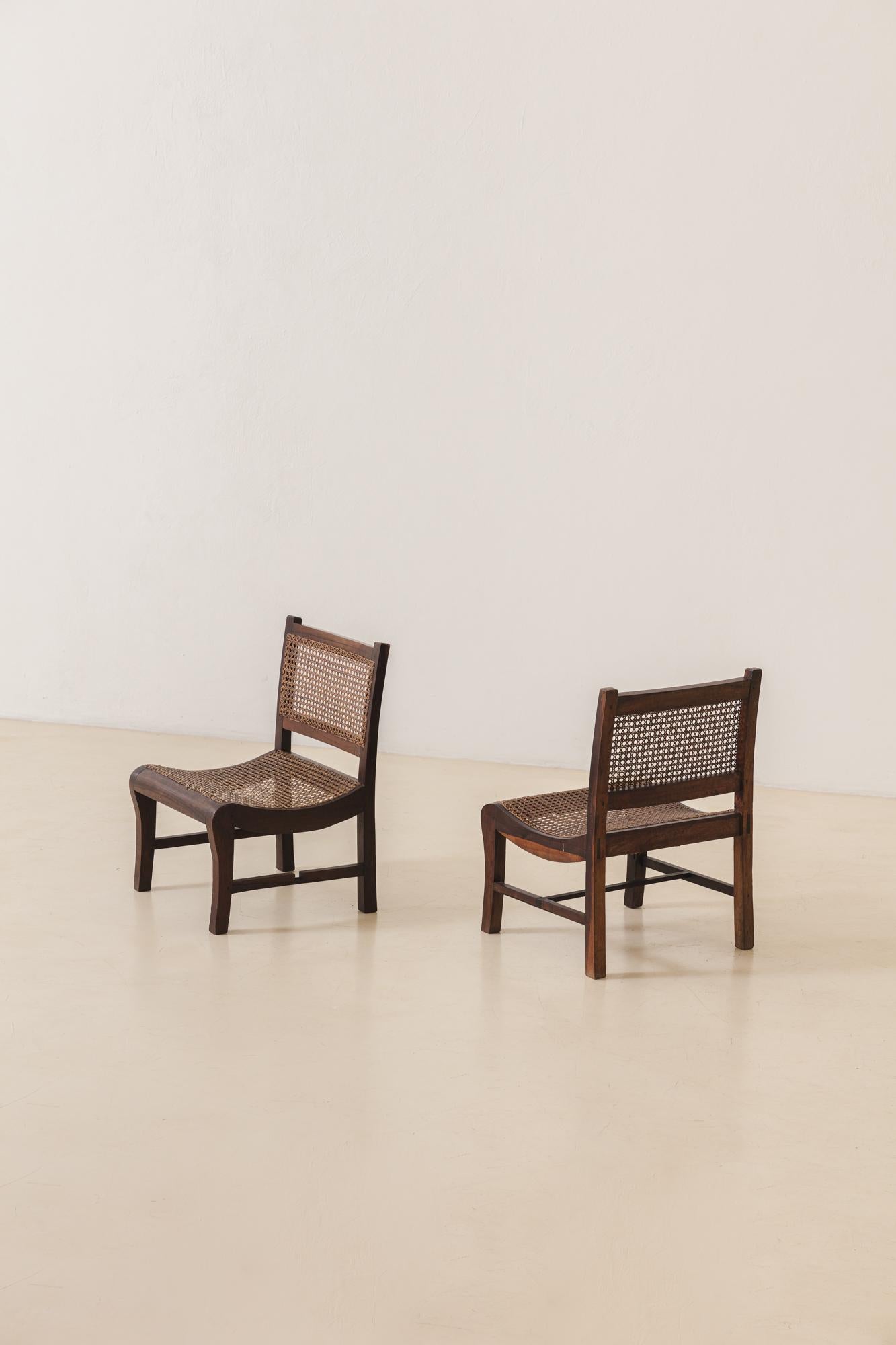 Mid-Century Modern Pair of Low Cane and Rosewood Lounge Chairs, Unknown Artist, 19th Century For Sale