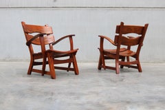 Pair of low Mid-century Design Brutalist lounge chairs / arm chairs in solid oak
