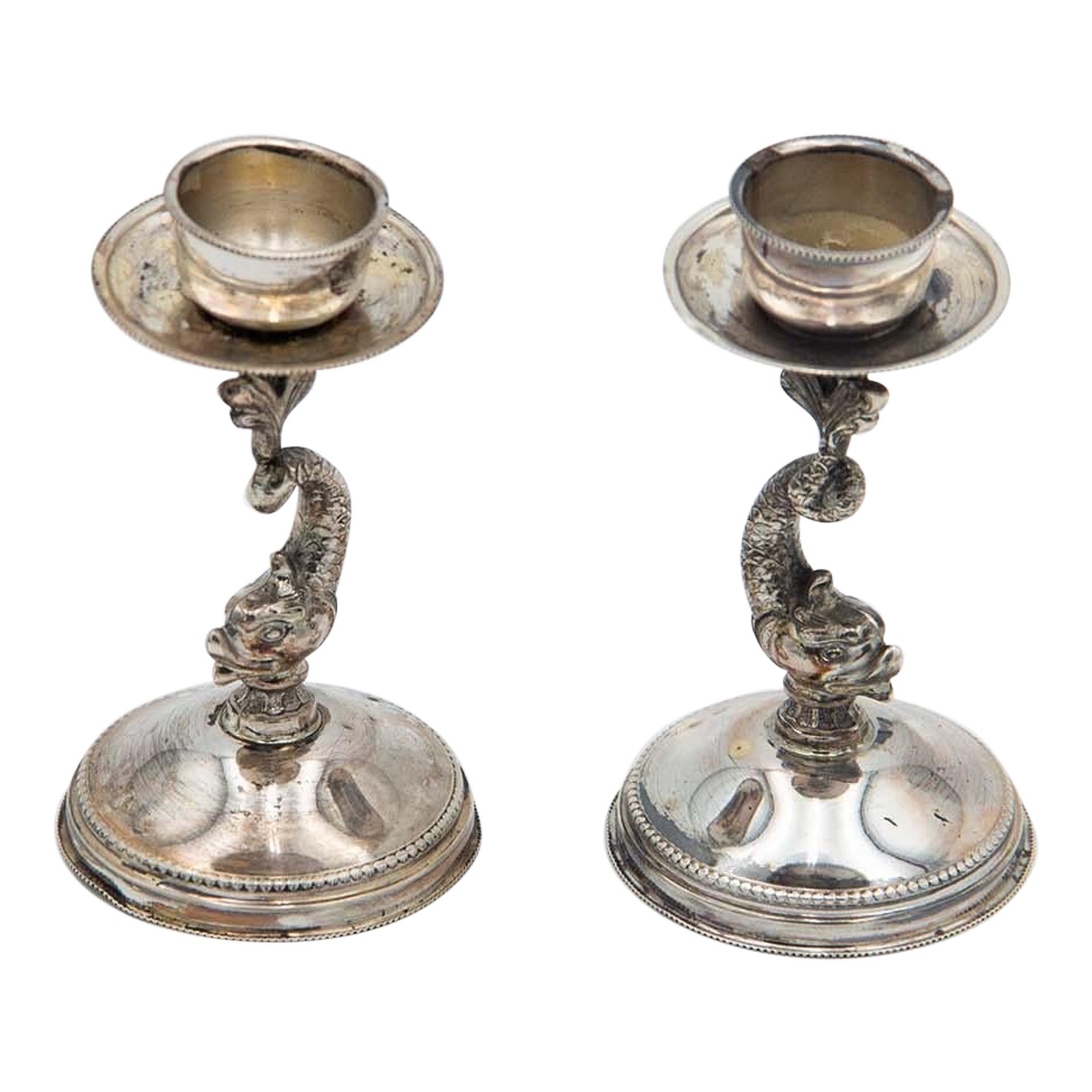 Pair of low silver fish-shaped candlesticks For Sale