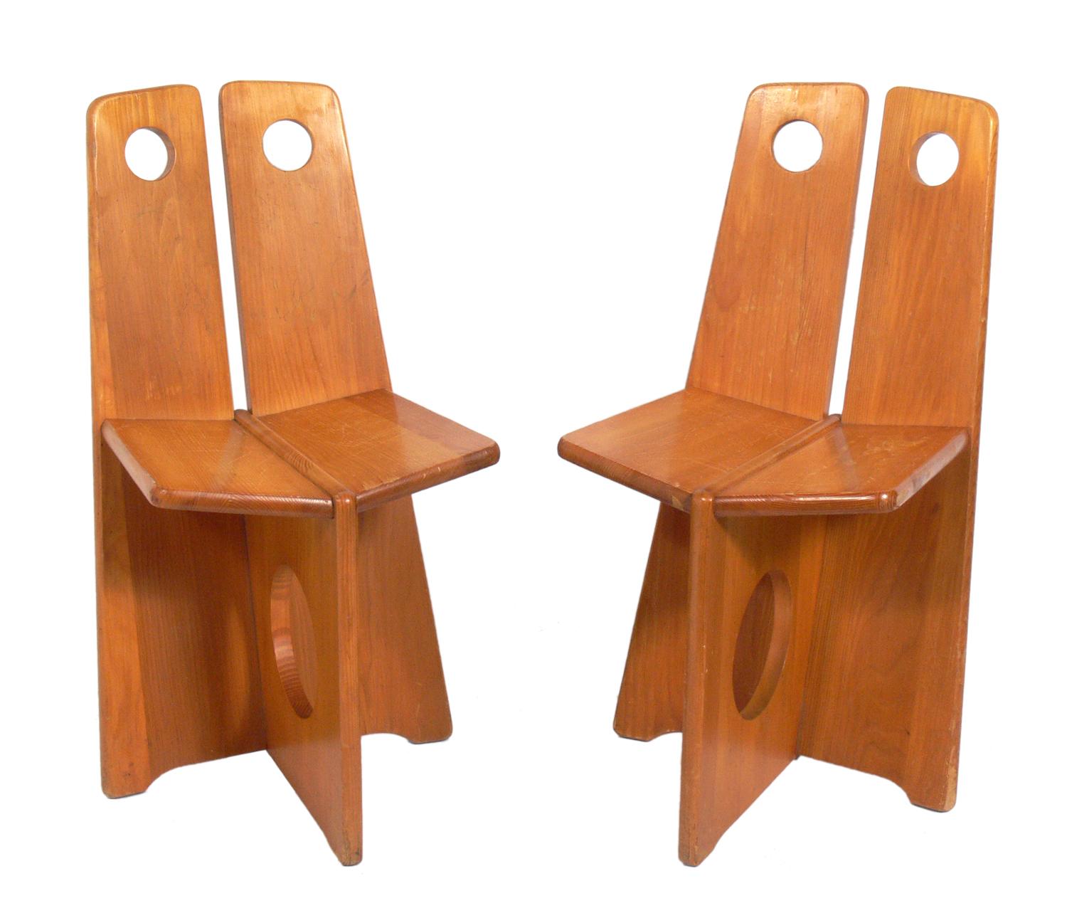 Pair of low slung constructivist chairs, German, circa 1950s. Design clearly influenced by Russian constructivism. Well worn, industrial vibe with warm original patina. They are a low slung lounge size, and appear to be kid sized, but are actually