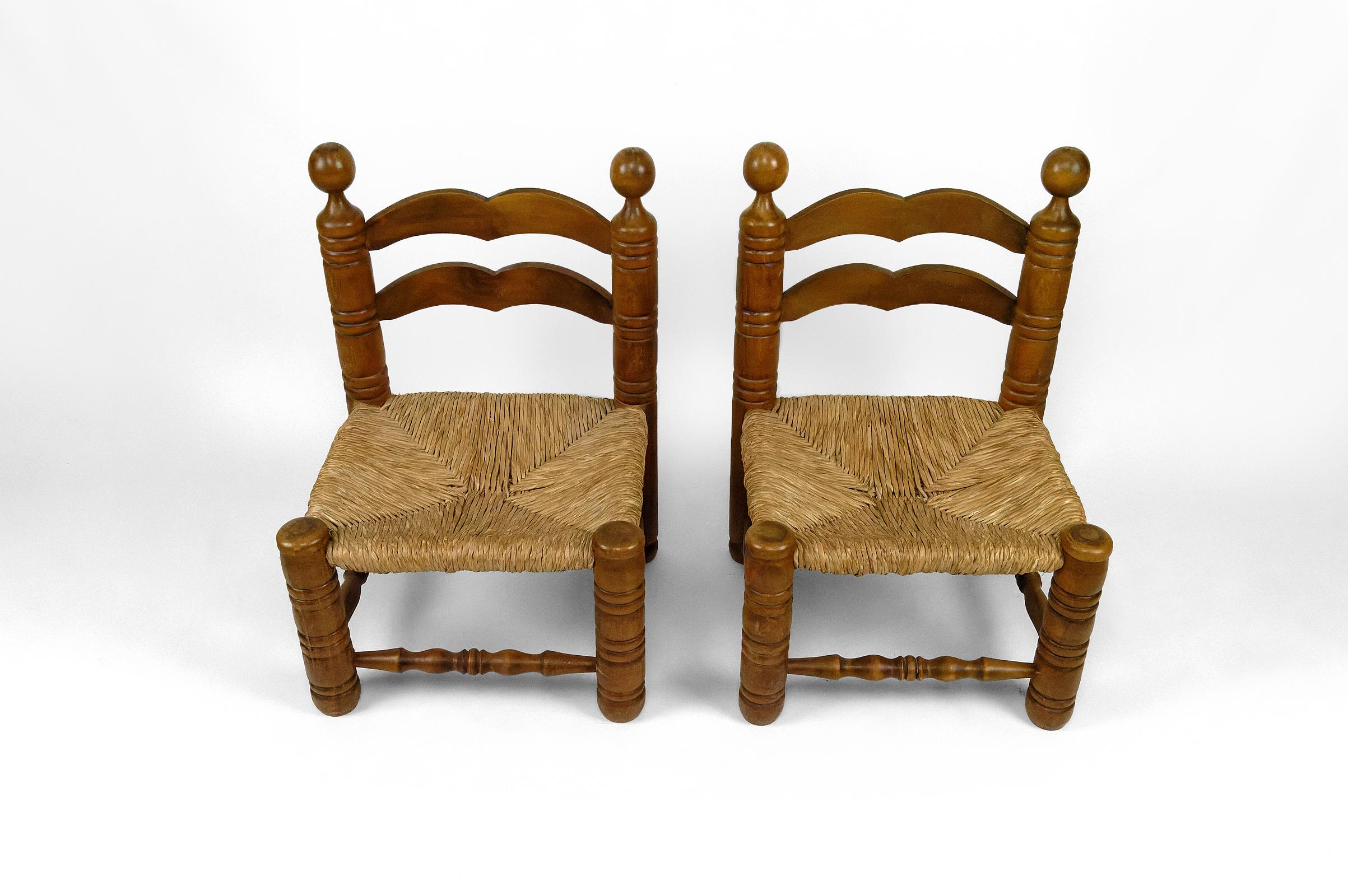 Pair of low straw chairs by Charles Dudouyt, France, circa 1940 For Sale 3