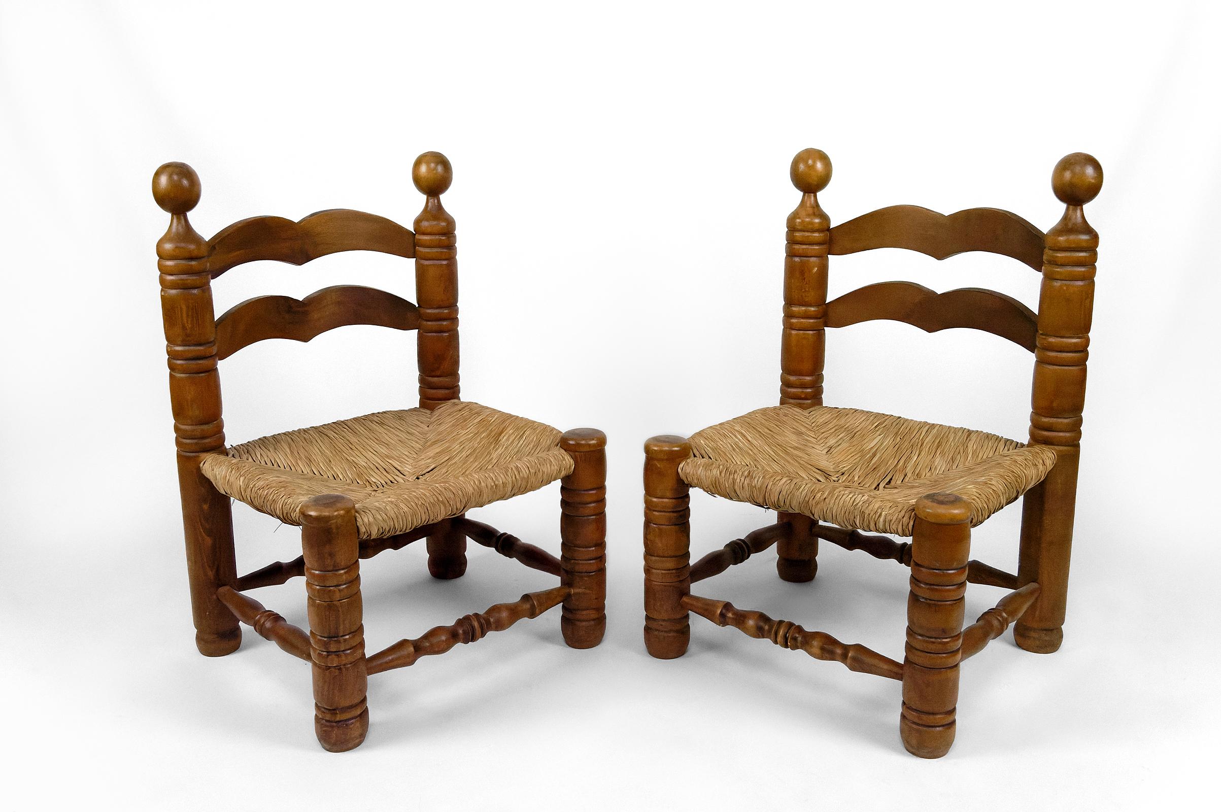 Pair of low chairs by Charles Dudouyt.

Dudouyt began his career as a cabinetmaker and worked for important cabinetmakers, such as Dominique, and for private clients. He quickly developed a distinctive style that combined traditional elements with