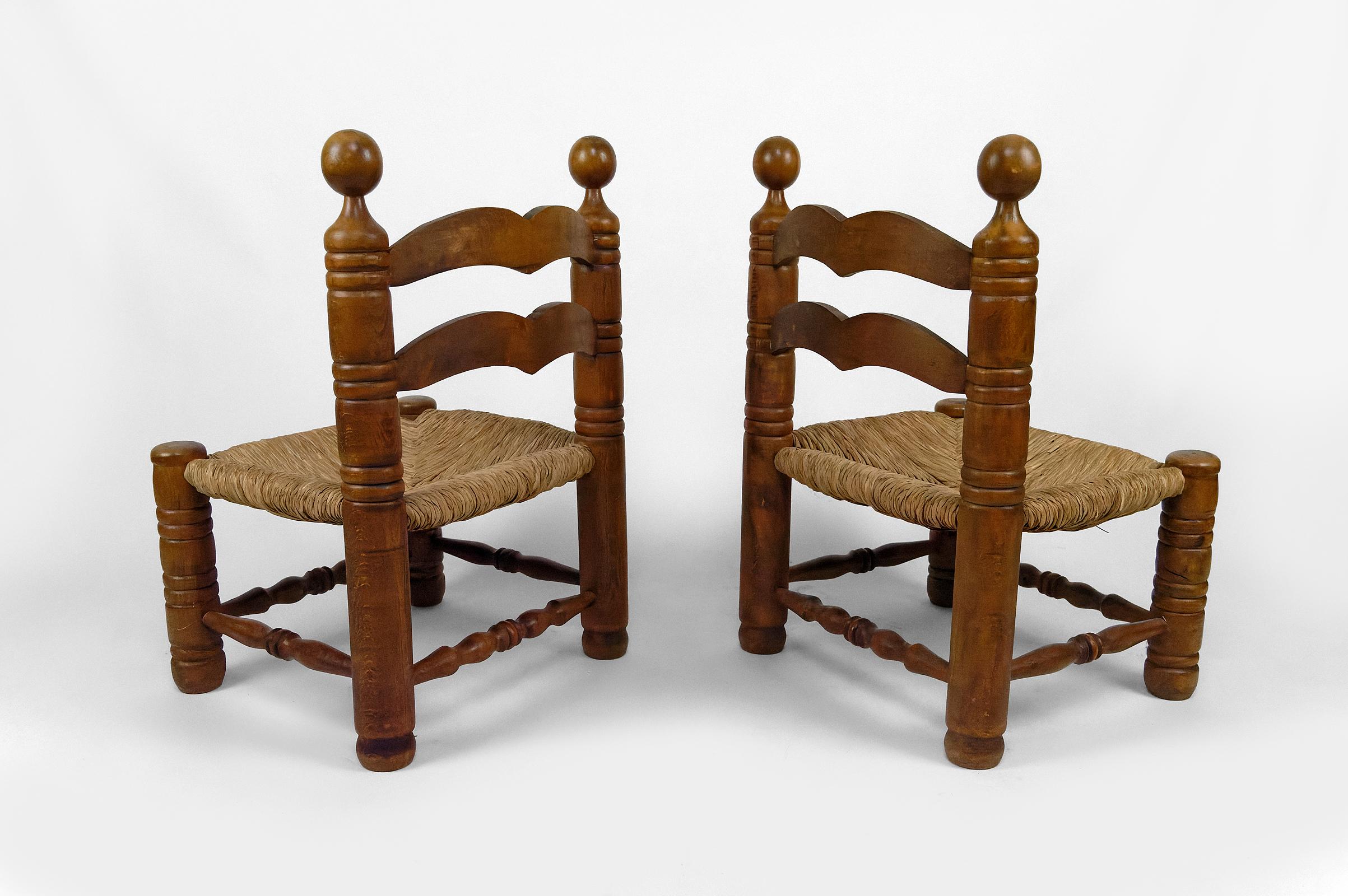 Mid-20th Century Pair of low straw chairs by Charles Dudouyt, France, circa 1940 For Sale