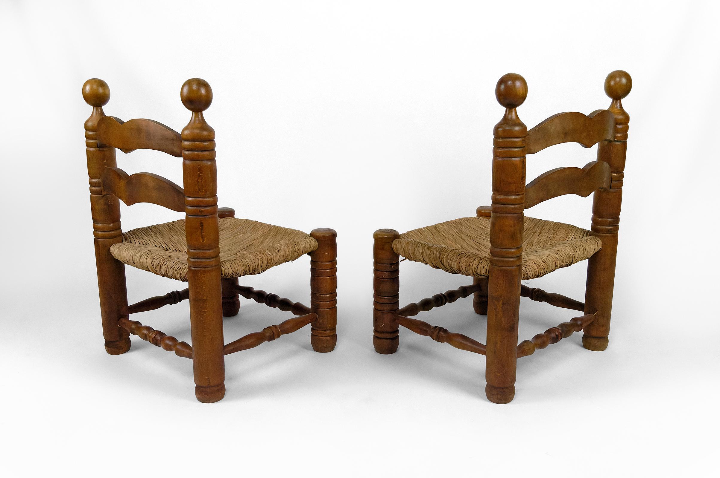 Straw Pair of low straw chairs by Charles Dudouyt, France, circa 1940 For Sale