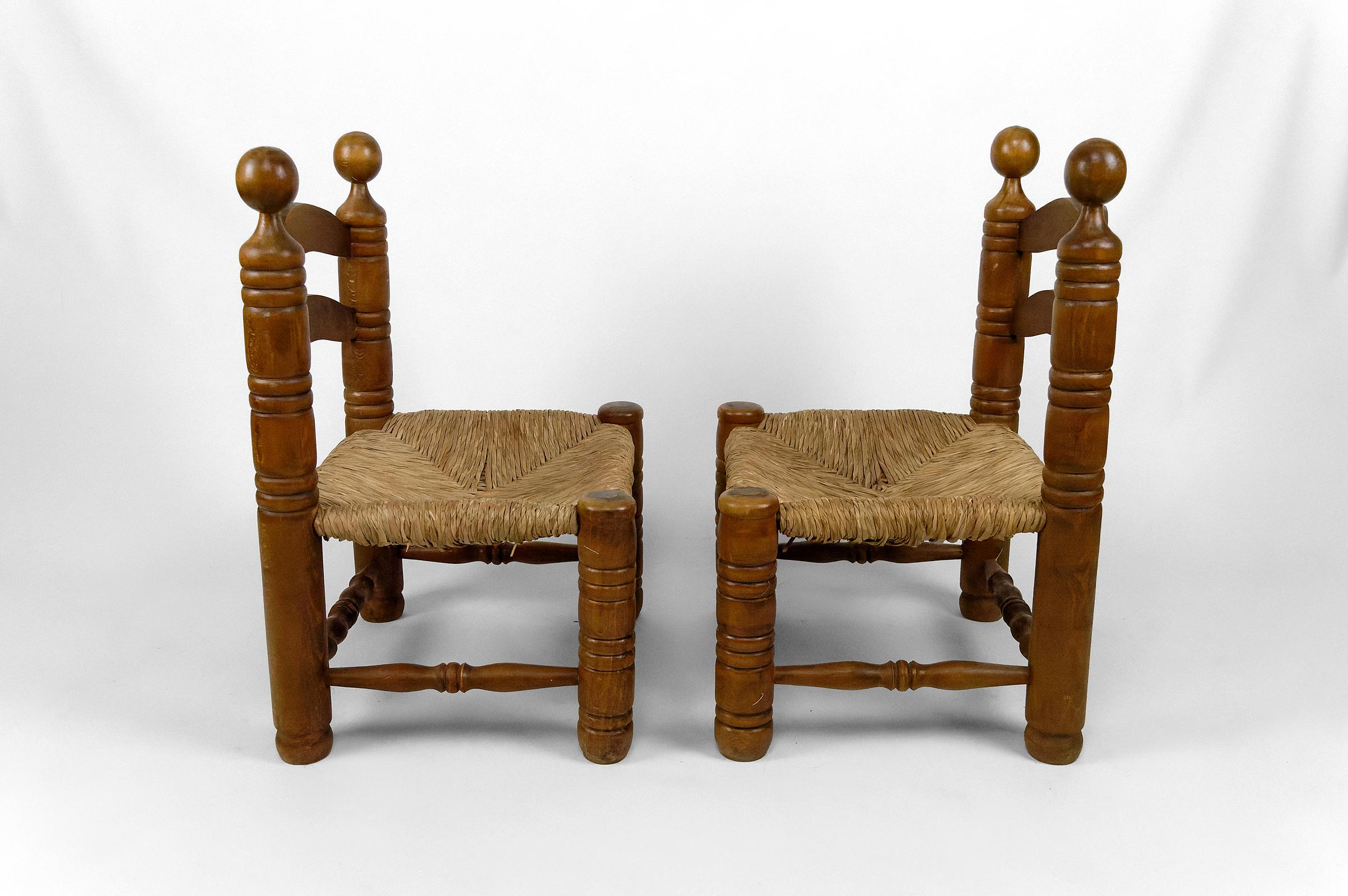 Pair of low straw chairs by Charles Dudouyt, France, circa 1940 For Sale 1
