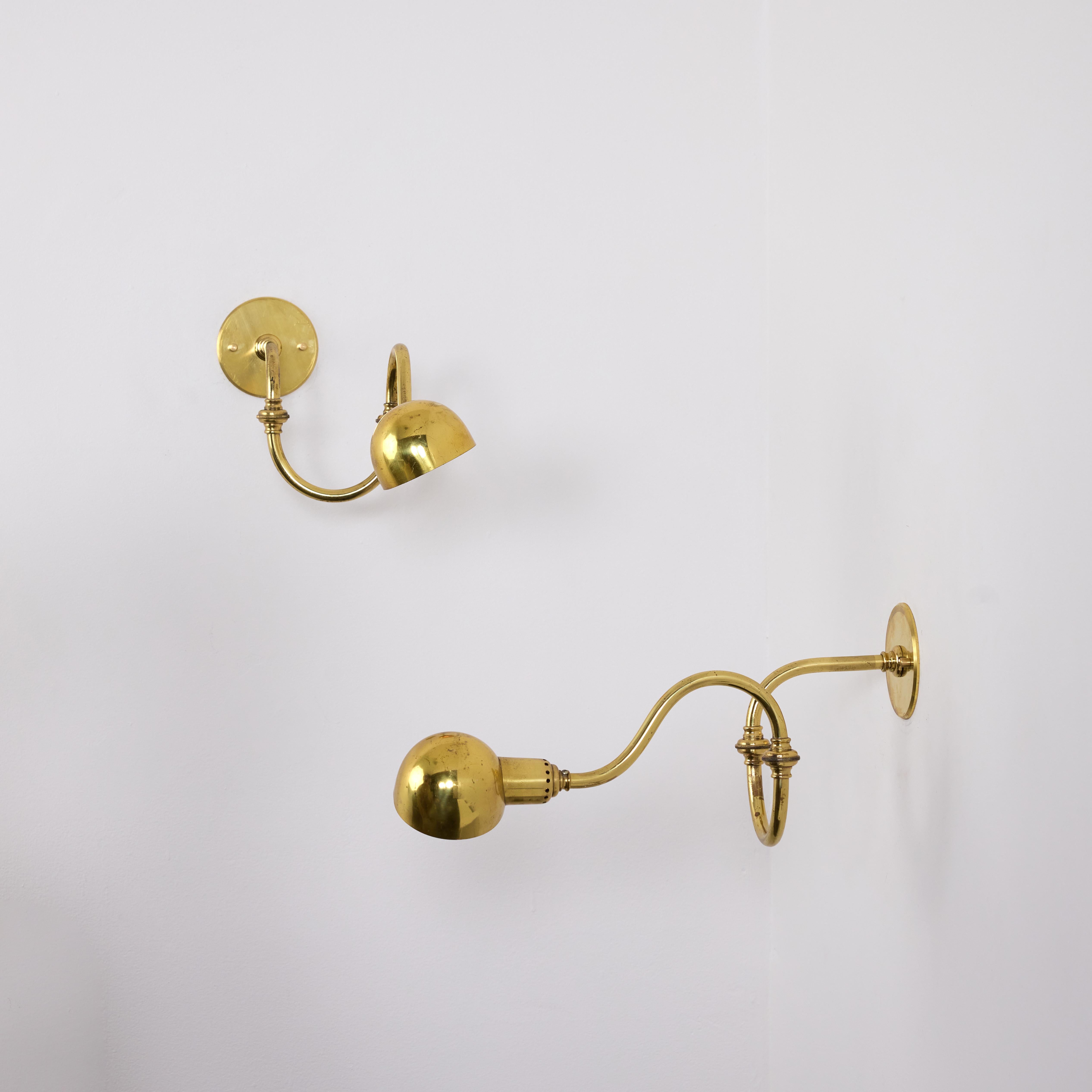 A pair of LP15 Tromba Sconces by Luigi Caccia Dominioni for Azucena. Designed and manufactured in Italy, circa 1950s. Arms and shade of light articulate to various positions. The Interior of shades are enameled. Wired for US. We recommend one E14