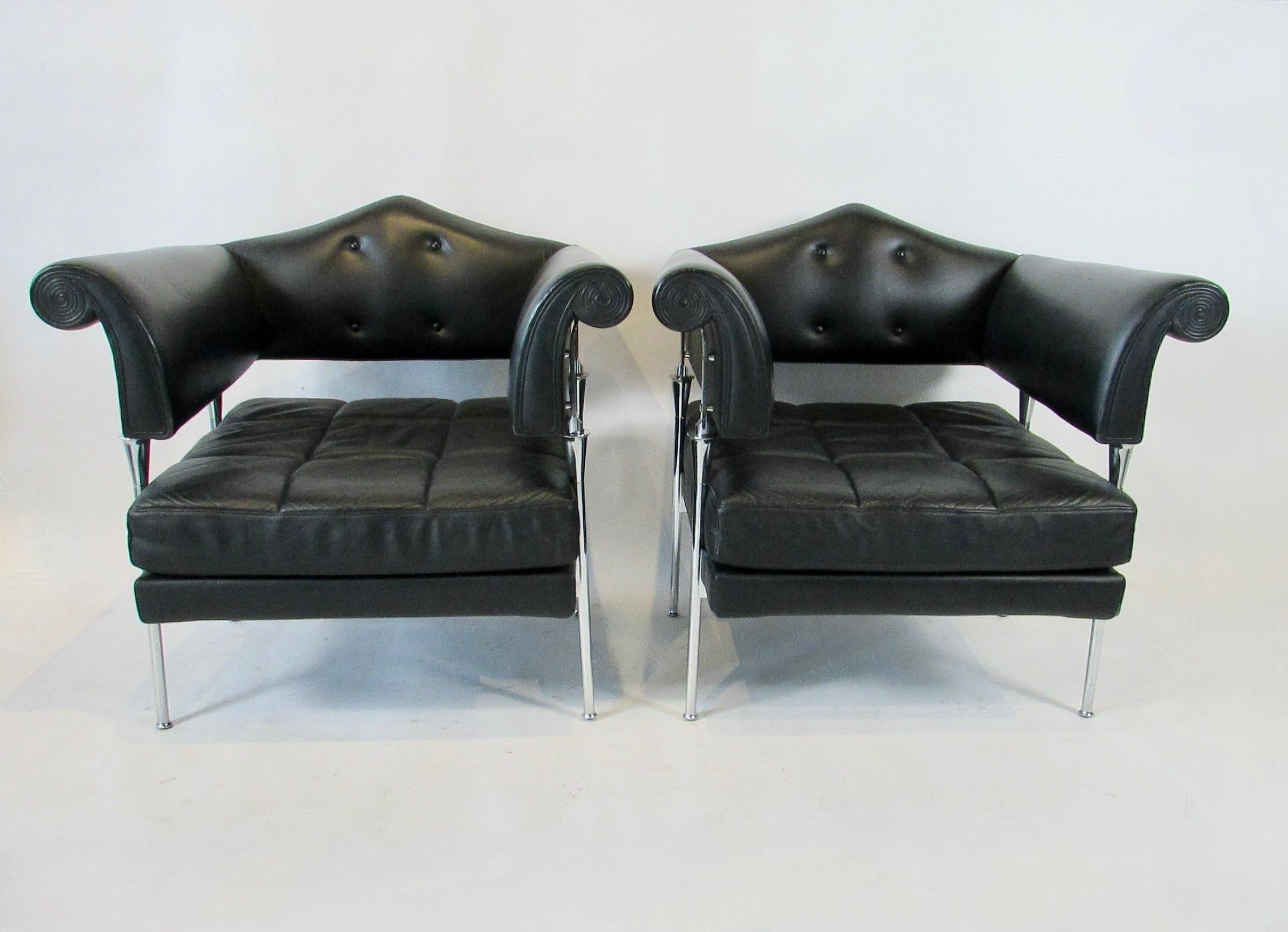Somewhat rare pair of stunning lounge chairs in black leather with mounted chrome hardware . Post modern de constructed vision of a classic armchair . Designed by Luca Scacchetti for Poltrana Frau . Wonderful quality pair of chairs in fine condition