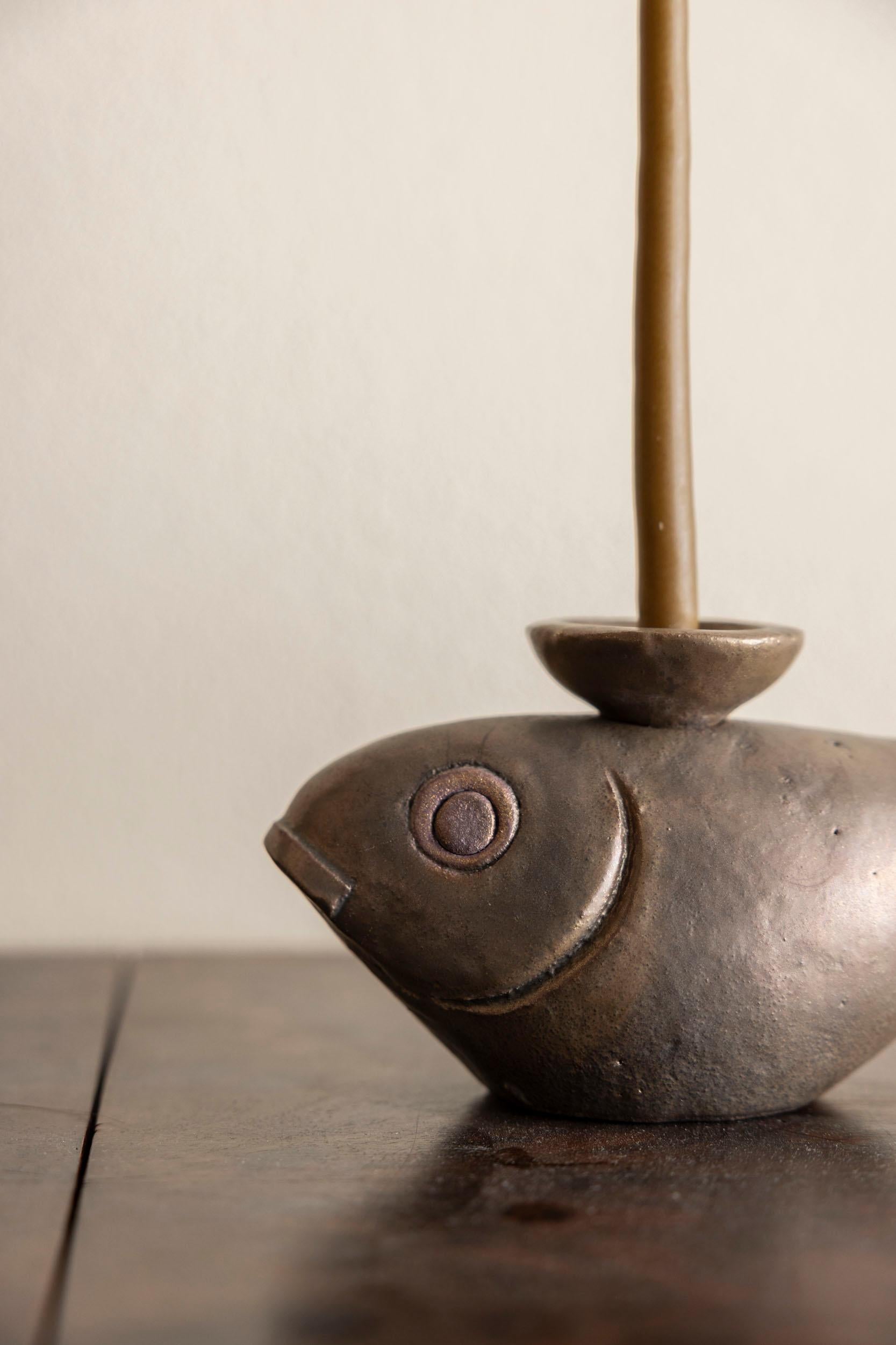 Paire de bougeoirs en grès émaillé 