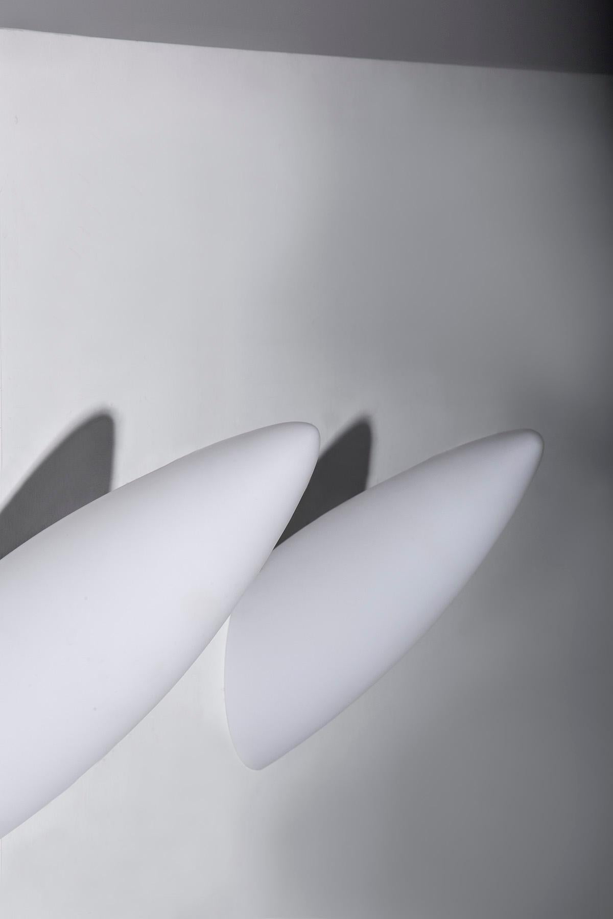 Late 20th Century Pair of Luci Fair wall lamps by Philippe Starck for Flos For Sale