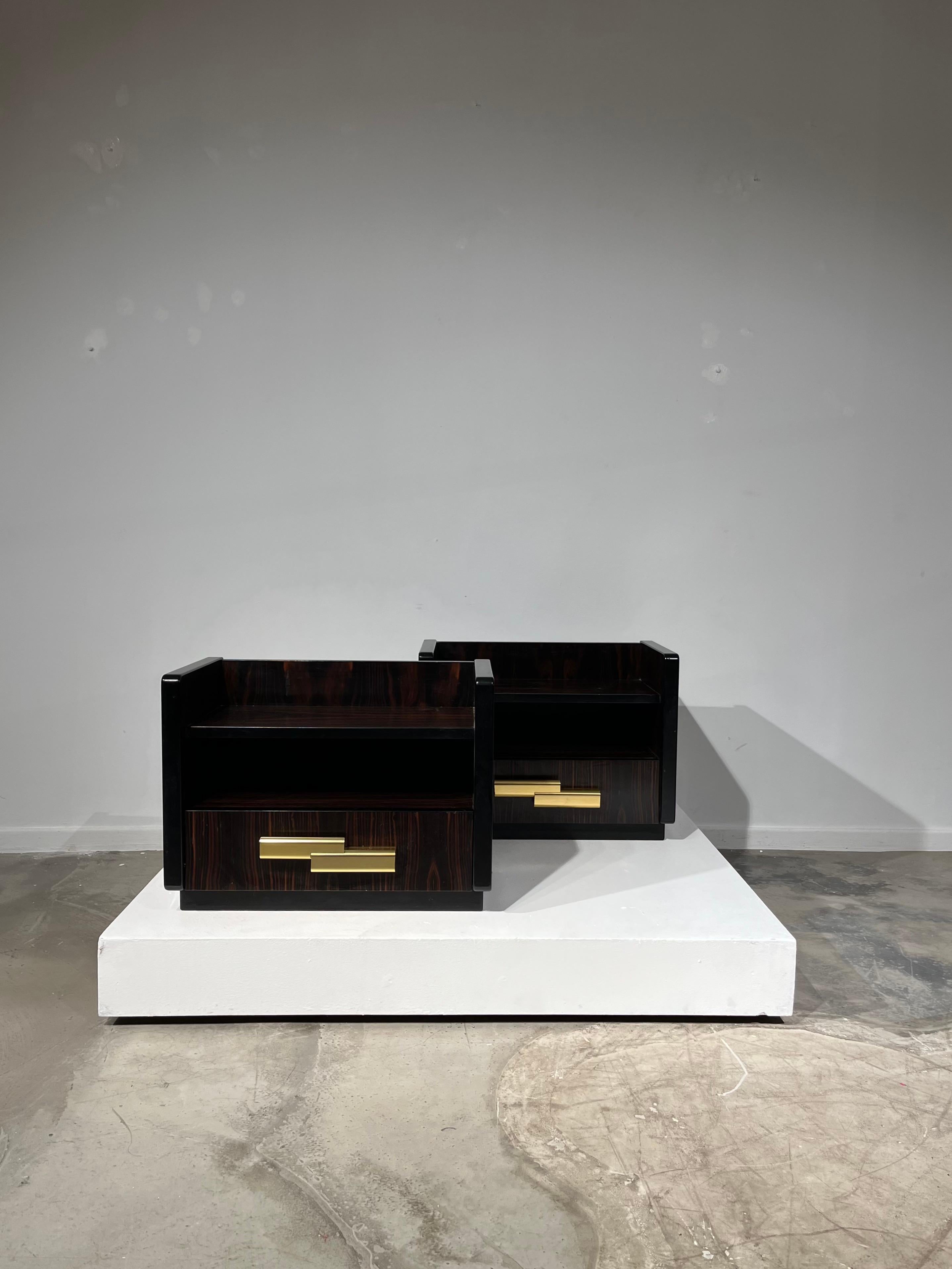 Pair of Luciano Frigerio bedsides with brass handles.
 