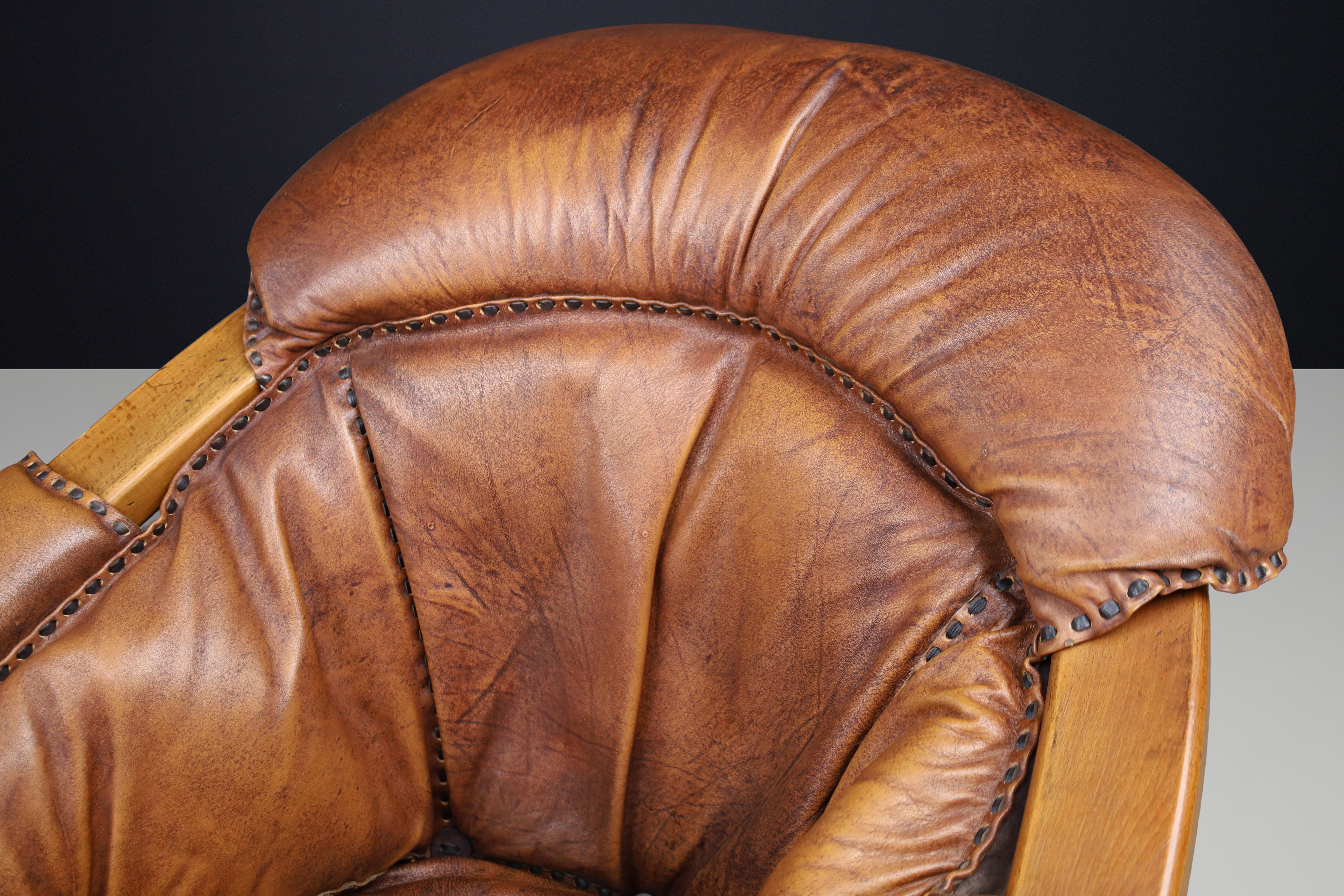 Pair of Luciano Frigerio Lounge Chairs in Cognac Leather and