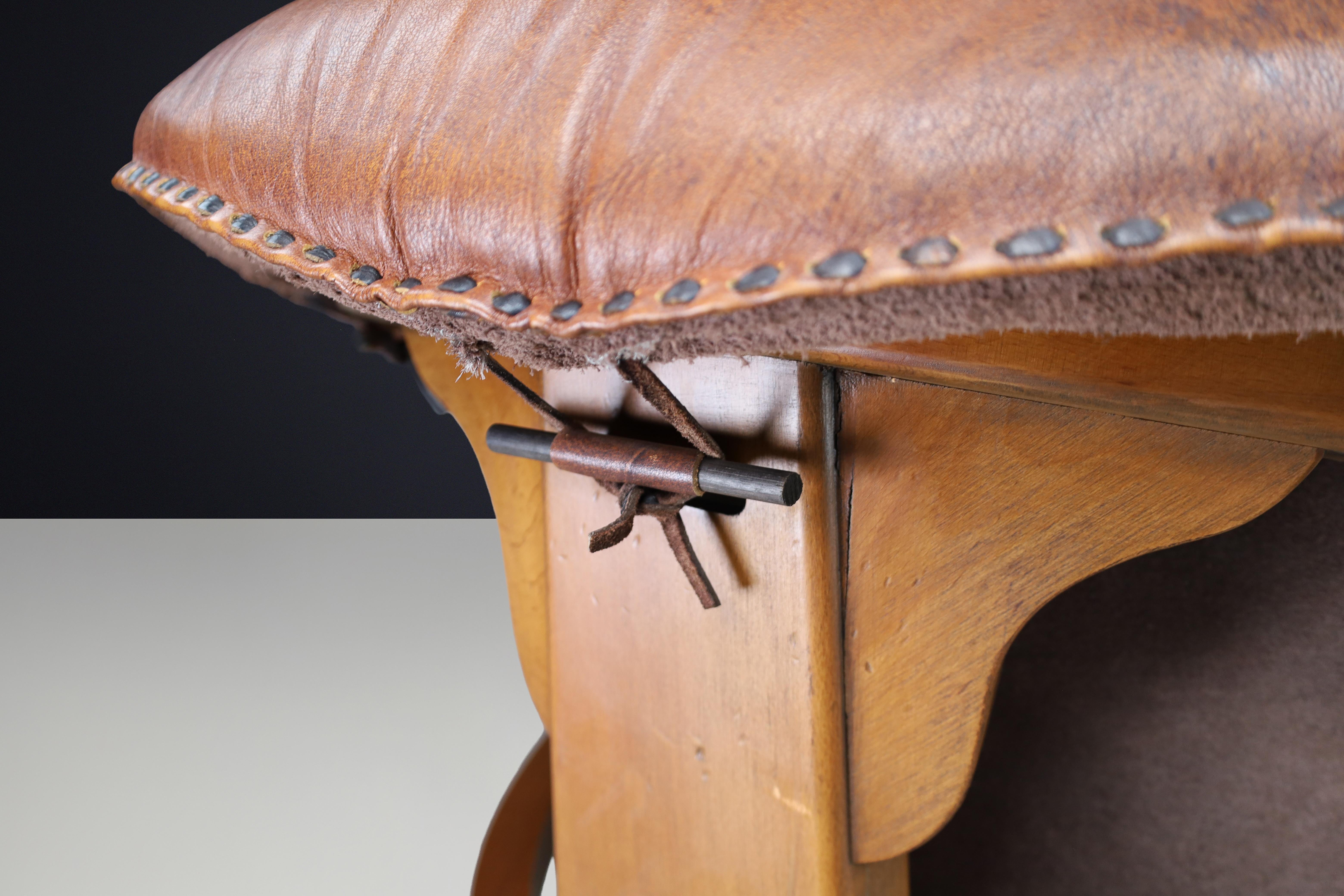 Pair of Luciano Frigerio Lounge Chairs in Cognac Leather and