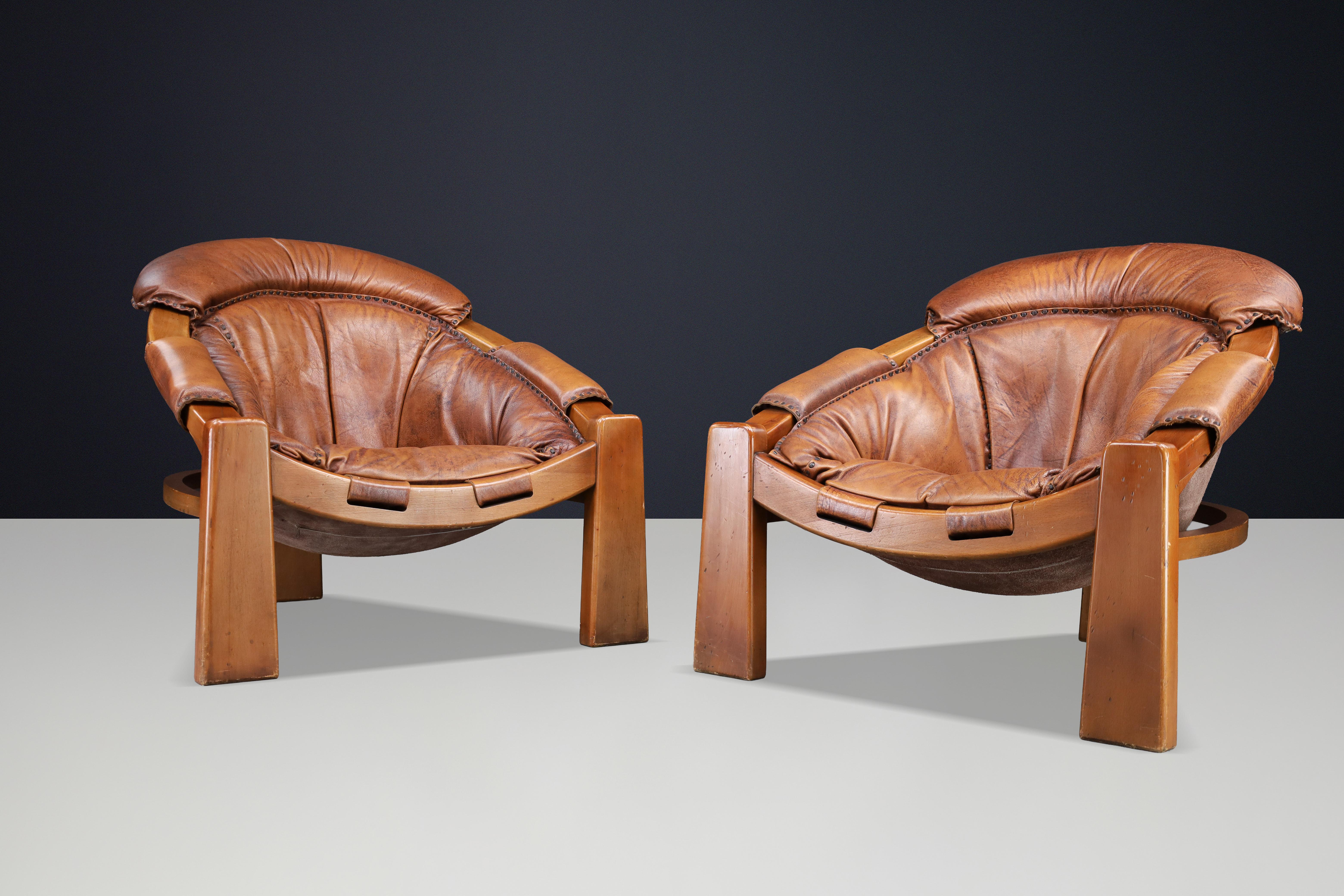 Pair of Luciano Frigerio Lounge Chairs in Cognac Leather and