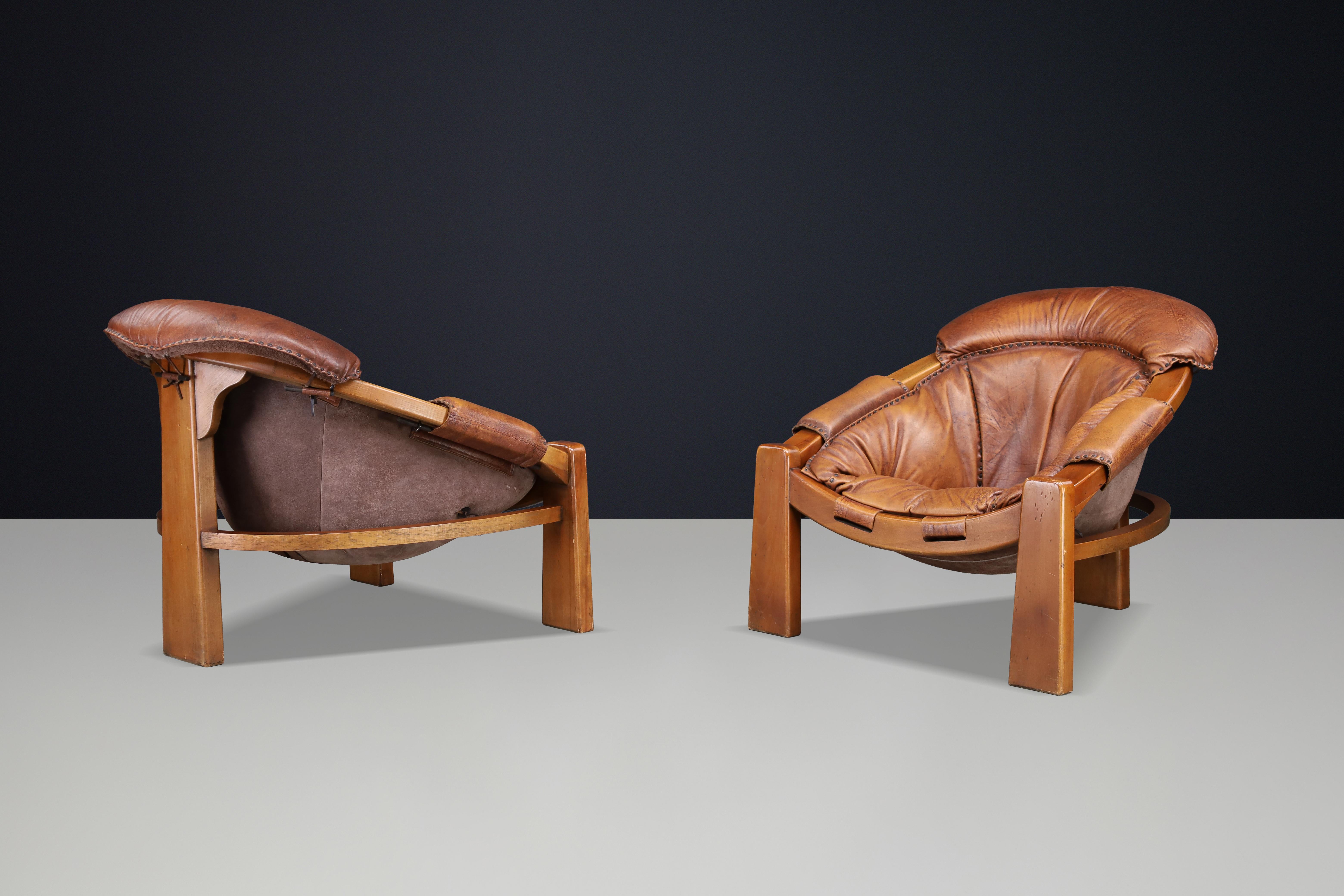 Pair of Luciano Frigerio Lounge Chairs in Cognac Leather and