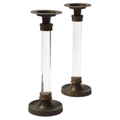 Coppia di candelieri in lucite e bronzo