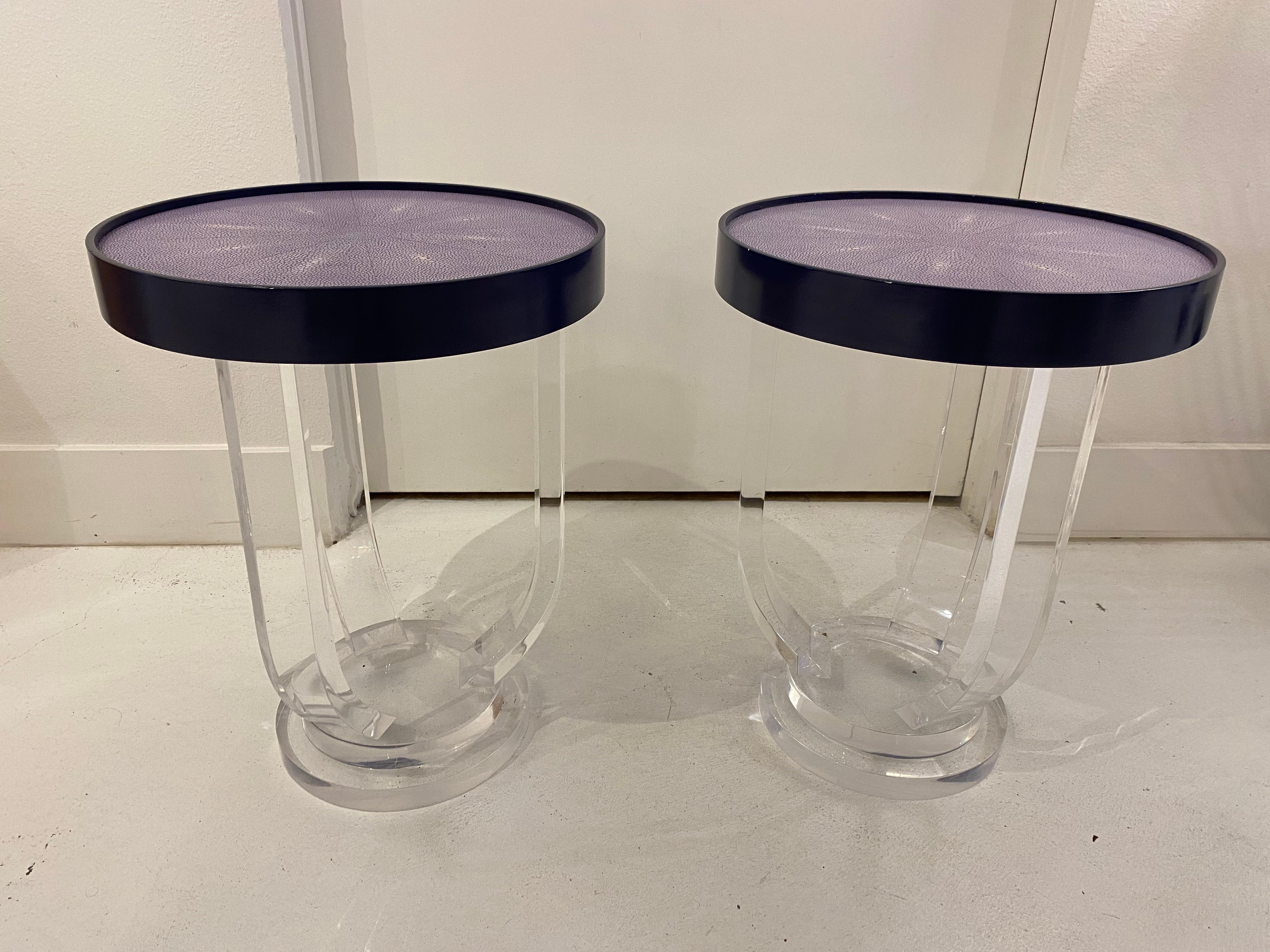 Here is a pair of faux shagreen side tables with lucite bases. The color is a whimsical purple with ample opportunity for multiple shades with the faux shagreen. The shagreen is scored to create a pie like design, with 8 sections. From above one can