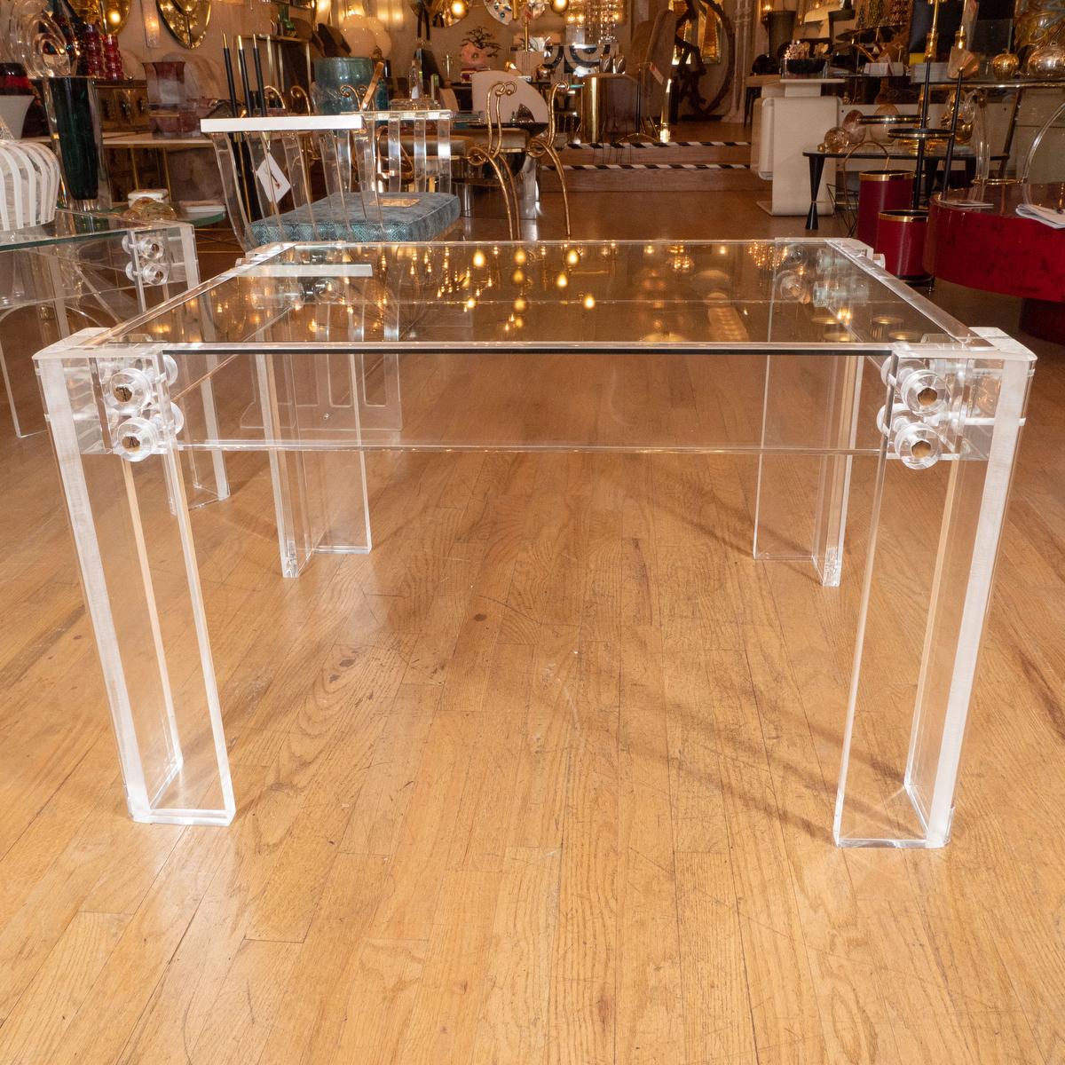 Pair of Lucite and glass end tables with nickel details.
