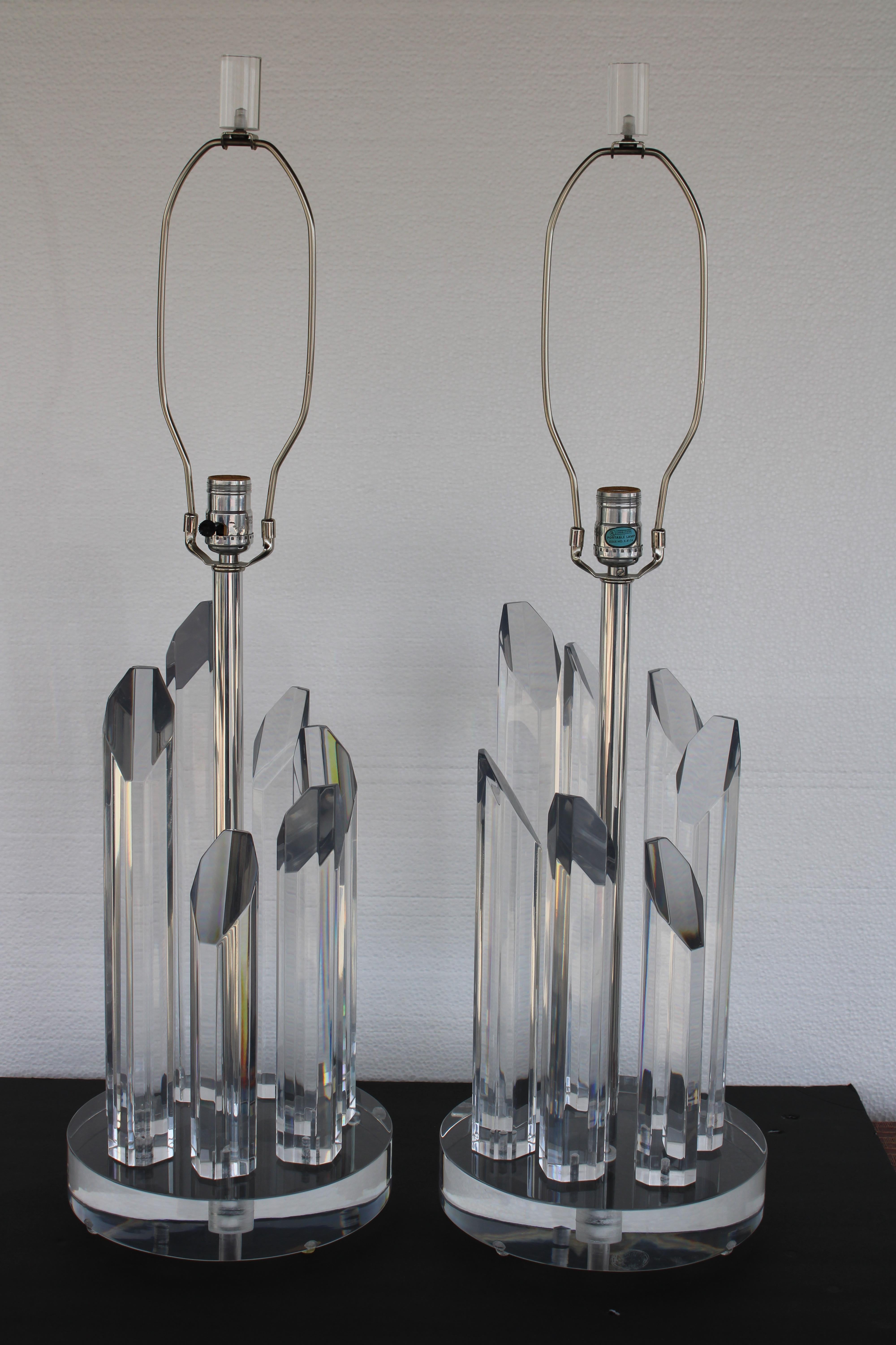 Pair of all original lucite lamps by Astrolite for the Ritts Company, Los Angeles, CA. Each lamp measure 20.5