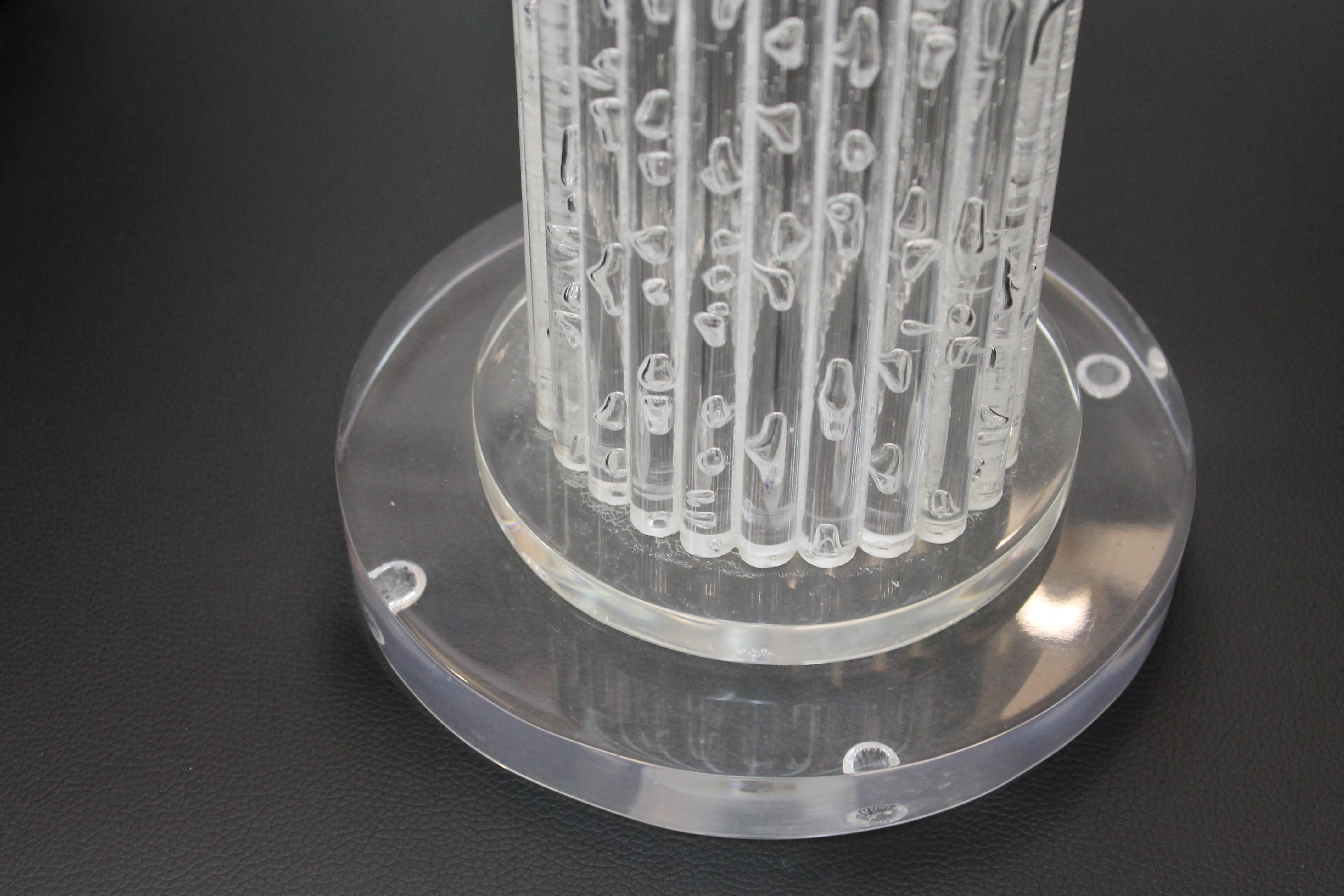 Pair of Lucite lamps consisting of Lucite rods. The Lucite rods are 15.75