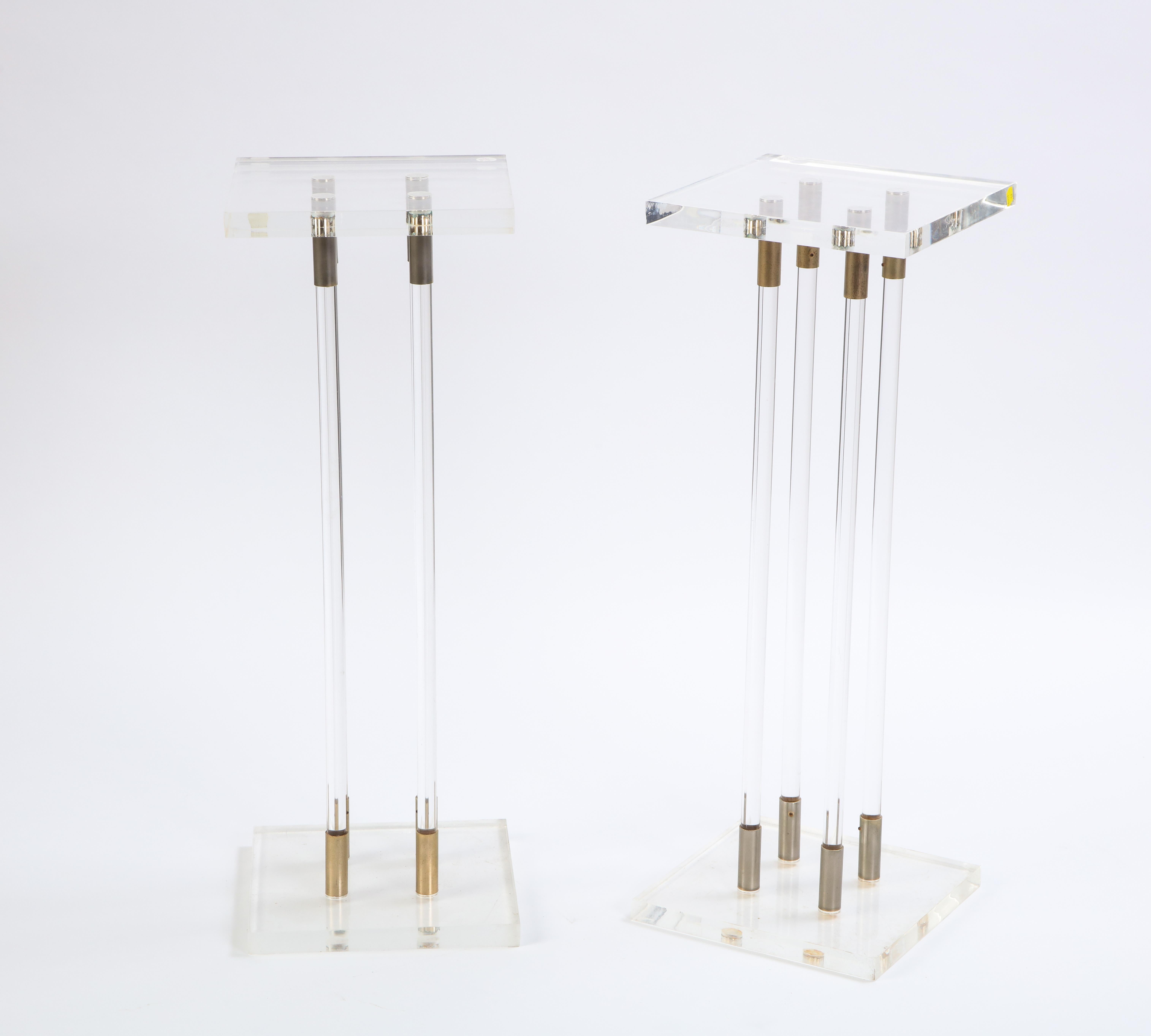 A pair of lucite pedestals, modern.

Presents well overall. With general overall marks, nicks, surface scratches and wear, as to be expected. Scratches most notable to tops and bases. Otherwise good decorative condition.
