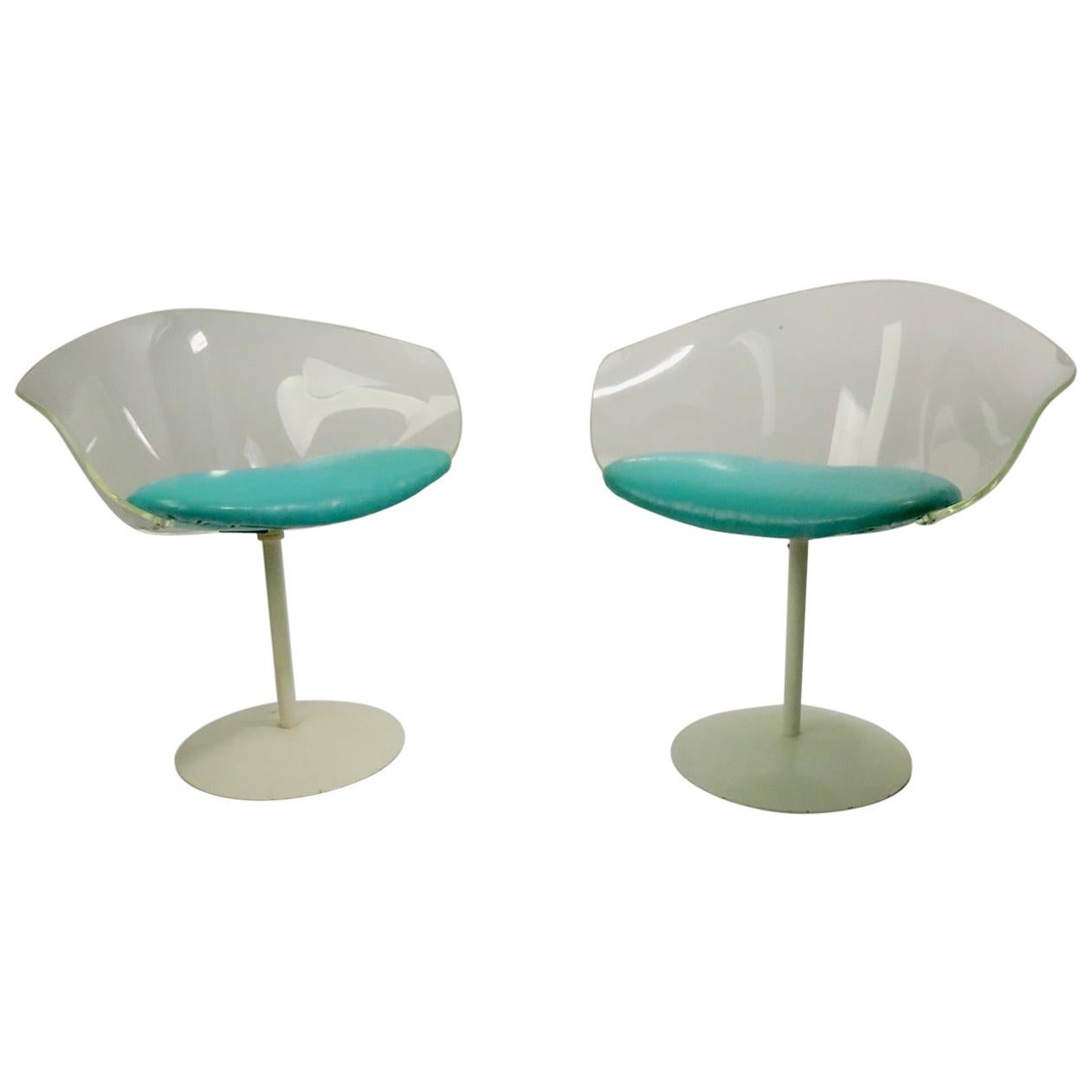 Pair of Lucite Shell Swivel Chairs