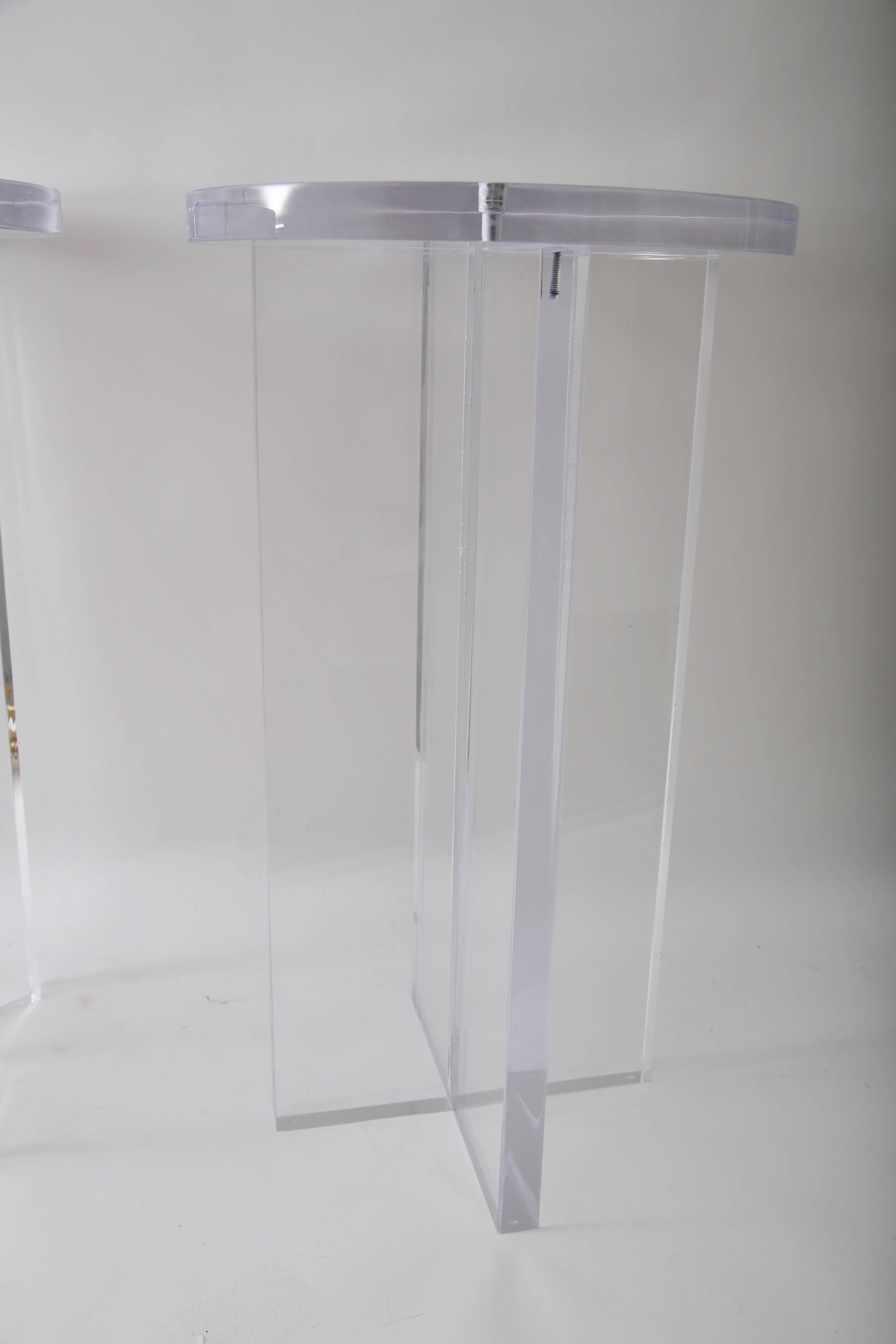 This stylish pair of Lucite side tables are a limited edition from Iconic Snob Galeries and will make the perfect drink table next to your chaise or lounge chair. 

Note: The pieces can be purchased as a pair and we also have two other available