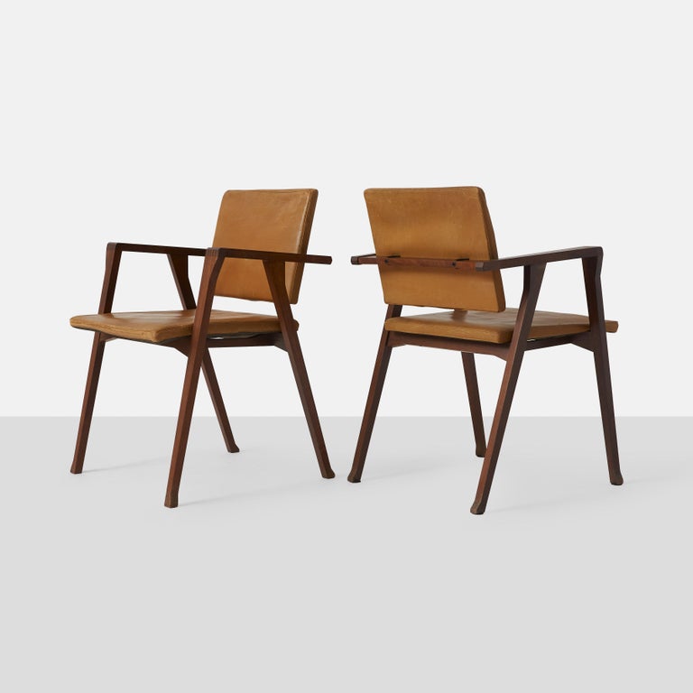 Two rosewood Luisa chairs with seats and backs upholstered in a patinated and weathered leather.

These examples are the versions for Poggi, rather than the reissued Cassina versions. The chair was awarded the Medal D’Oro by ADI, an Italian
