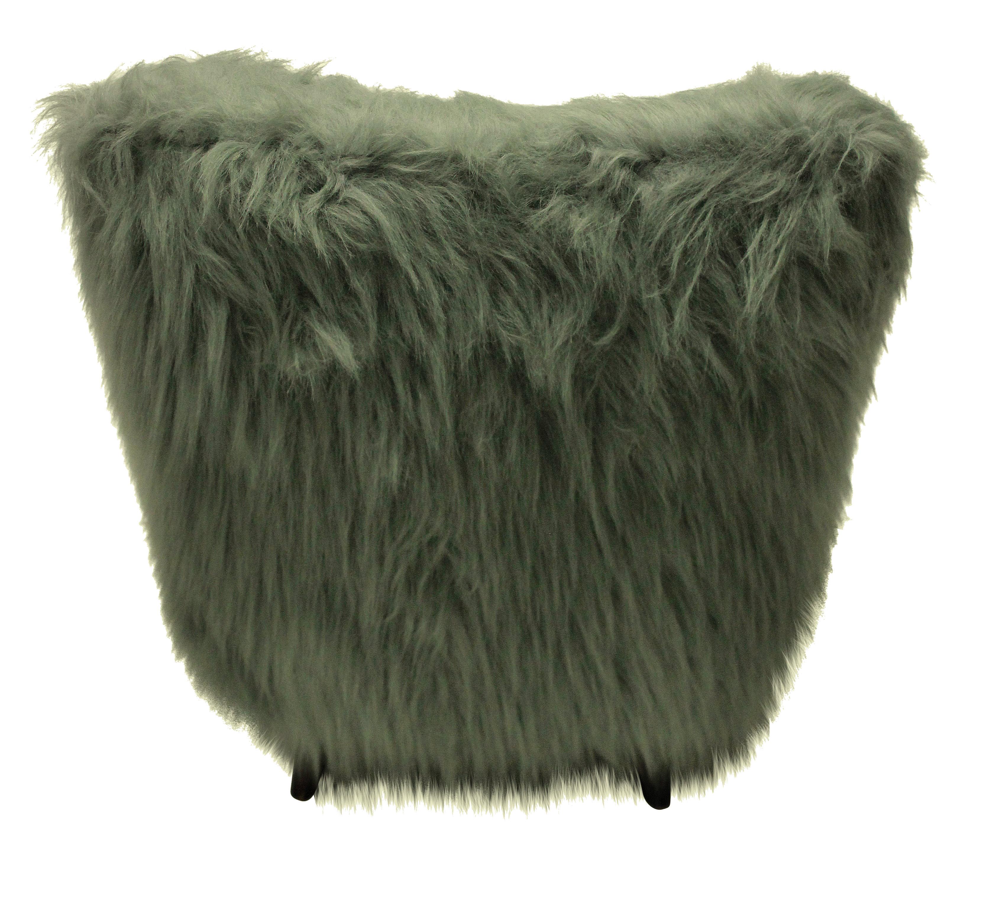 A pair of Italian midcentury extremely comfortable armchairs in faux fur.