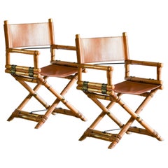 Pair of Lyda Levi #McGuire director’s chairs in rush and leather, 1970