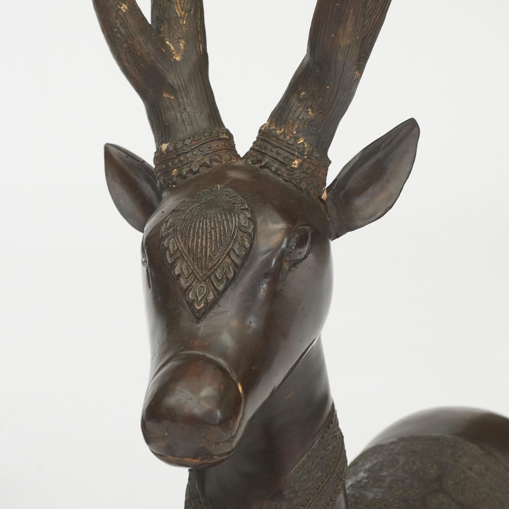 Late 20th Century Pair of Lying Deer Sculptures