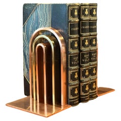 Coppia di reggilibri "Arco" dell'Età della Macchina di Walter Von Nessen per Chase and Co.