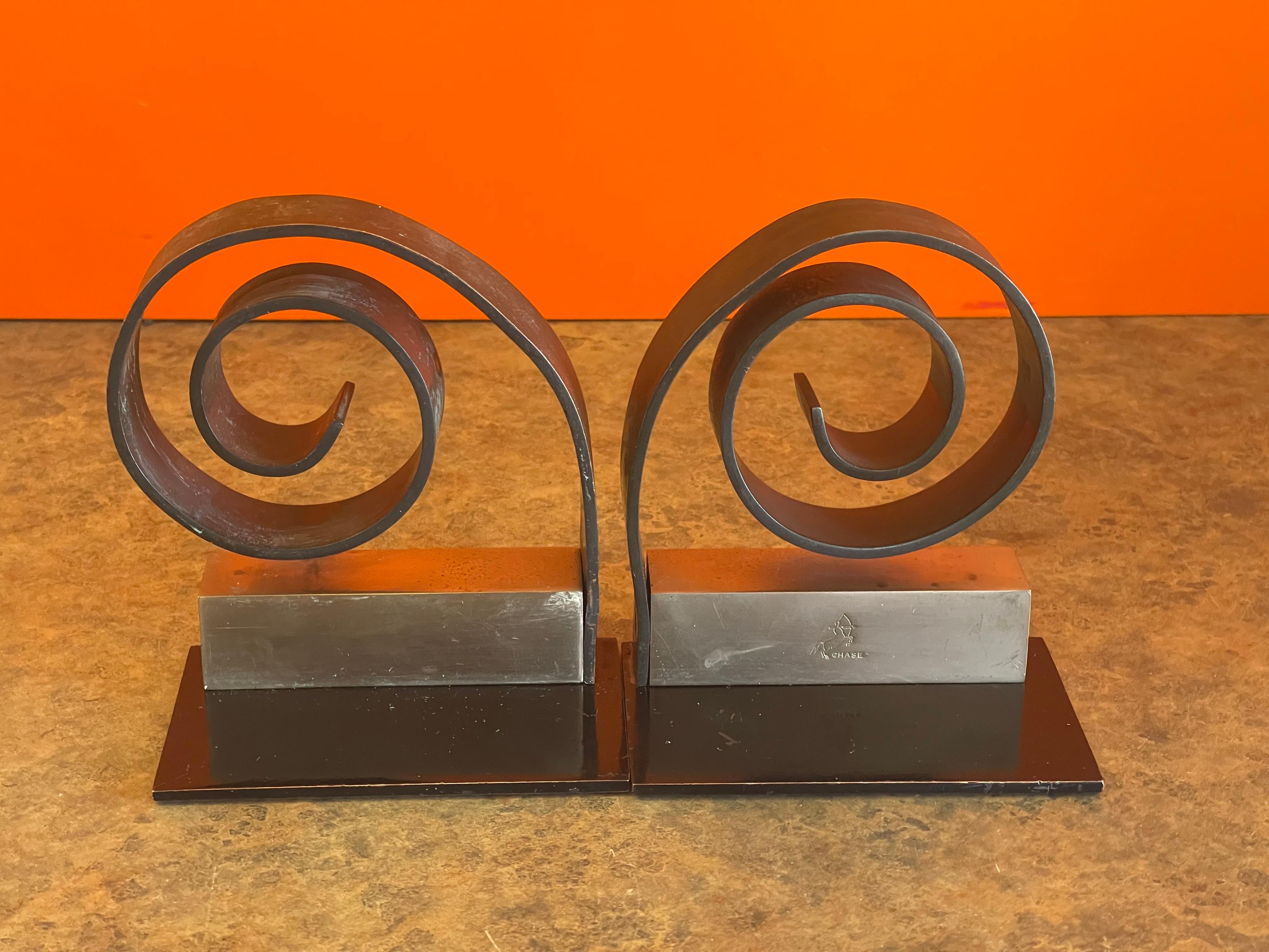 Pair of Machine Age Art Deco Bookends by Walter Von Nessen for Chase & Co.  In Fair Condition In San Diego, CA