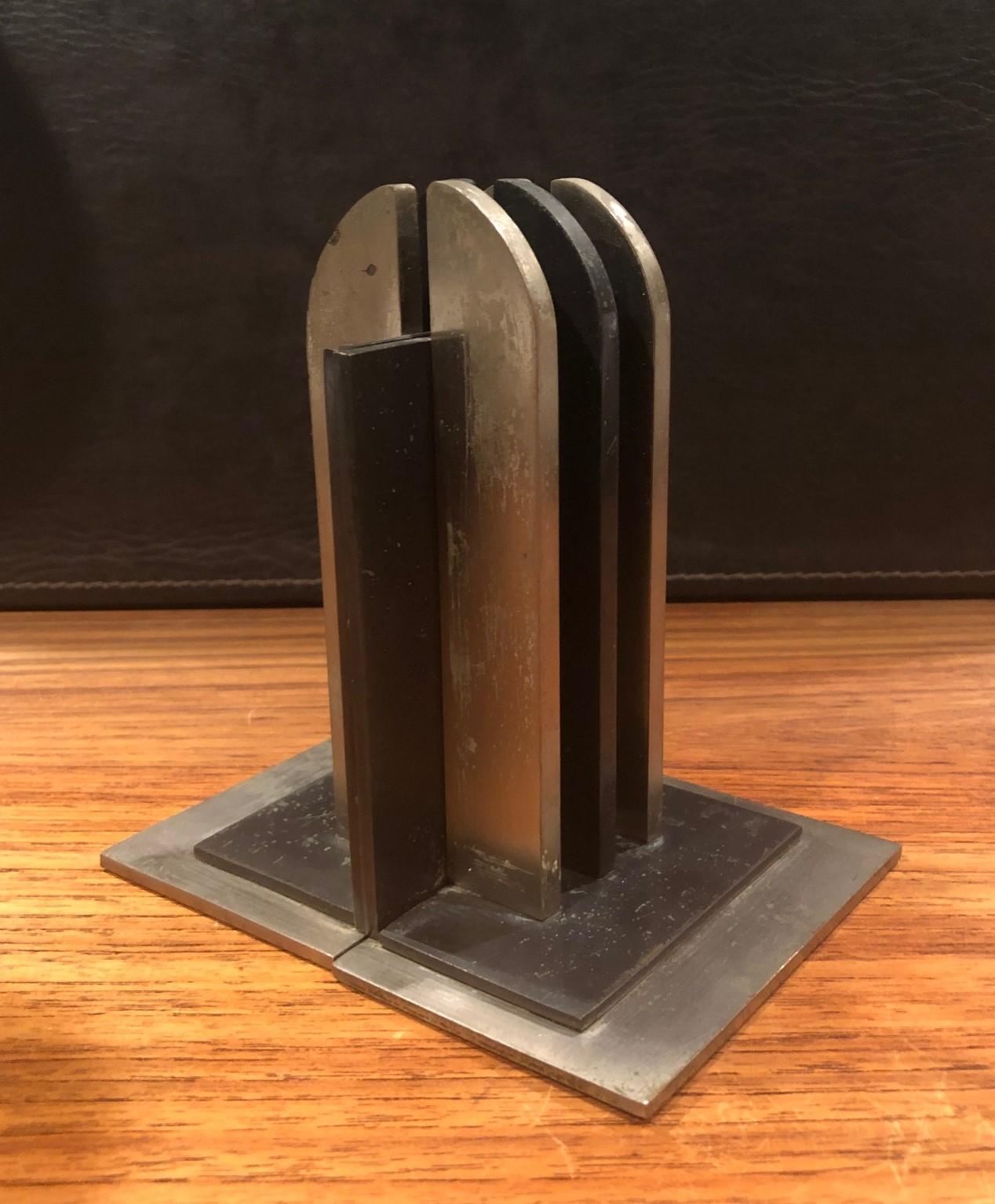 Brass Pair of Machine Age Art Deco Bookends by Walter Von Nessen for Chase & Co. No