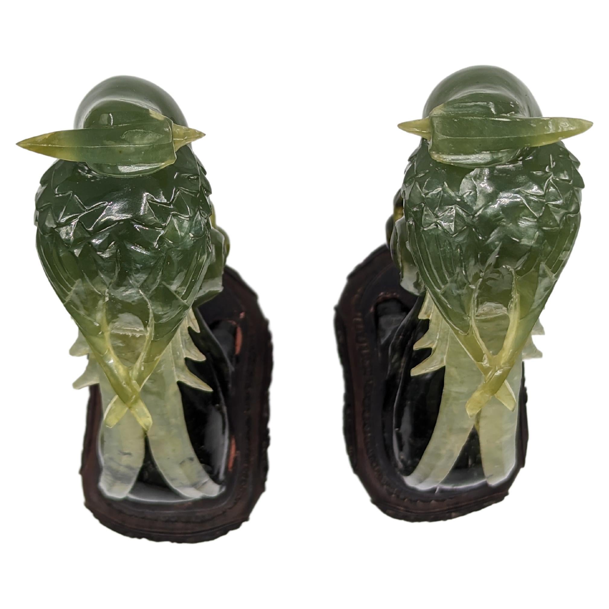 Pair of Magnificat Chinese Carved Jade Birds Of Prey On Wood Stands Early 20c  In Good Condition In Richmond, CA