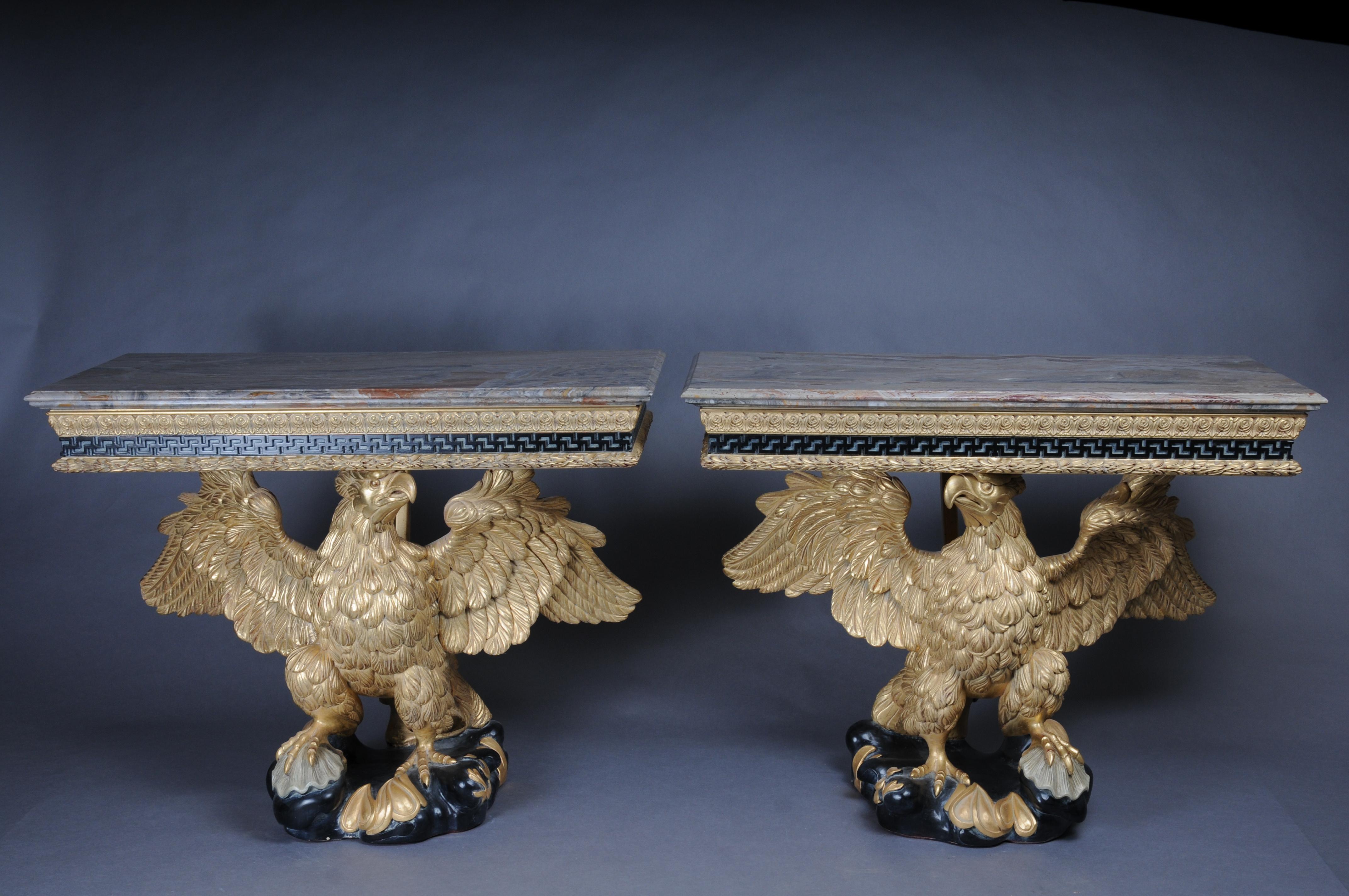 A pair of magnificent eagle consoles designed by William Kent 1685-1748

A few (2) consoles from the Régence era. Monumental, fully sculptural and hand carved eagles made of solid beech wood. Gilded, each standing on a rock-shaped base. Solid