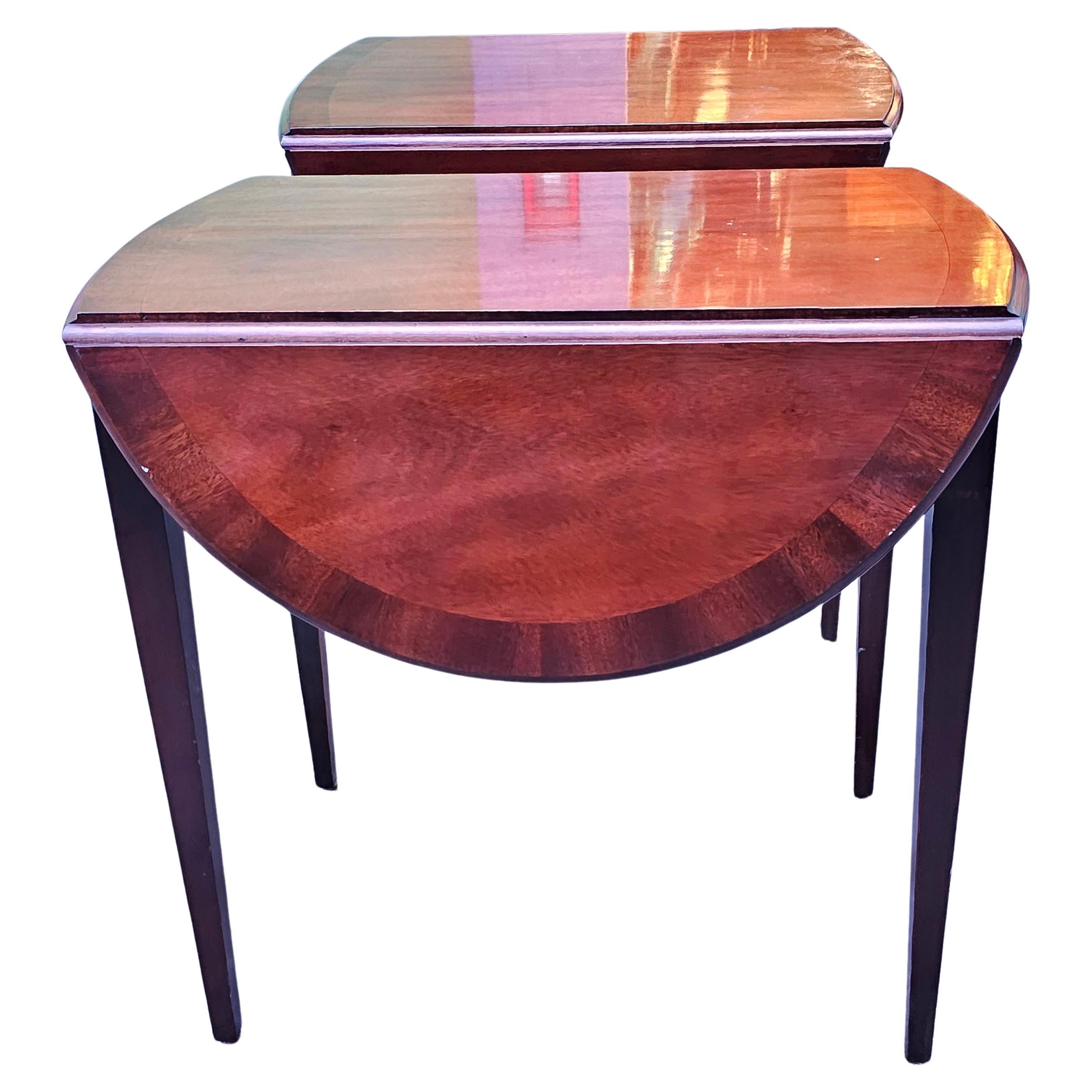 A Gorgeous Pair of Magogany Banded and Satinwood Inlaid Pembroke Drop-Leaf Side Tables in beautiful vintage condition. Feature a single drawer dovetail joints. Measure 20