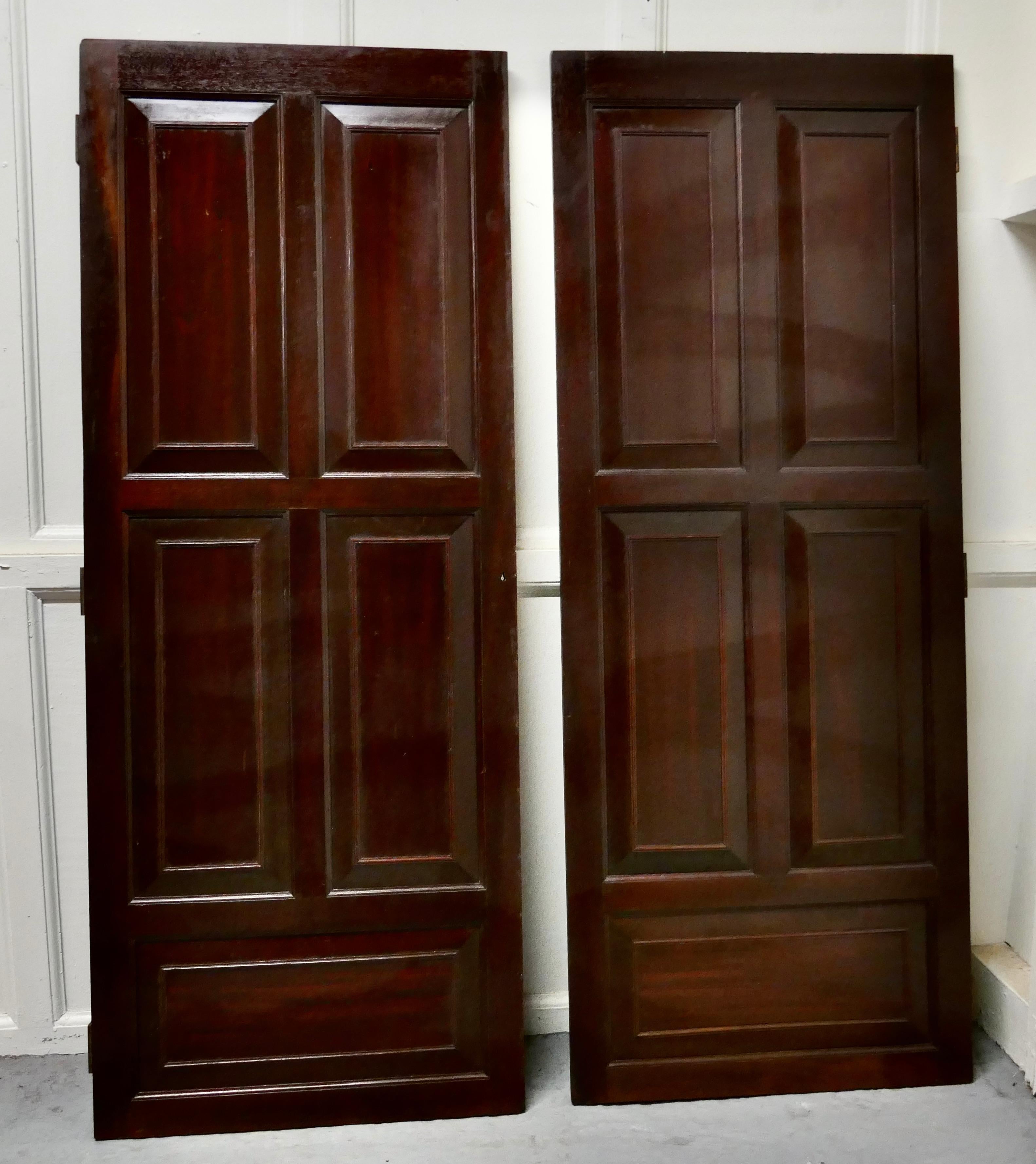 Pair of mahogany 5 panel cupboard doors 

This is a very attractive pair of mid-19th century panelled doors
The doors are in their original finish, they date from the 19th century, they are sound and made in solid wood

The doors are 56.5”