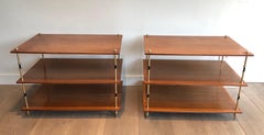 Pair of mahogany and brass three tiers console or side tables, Maison Jansen
