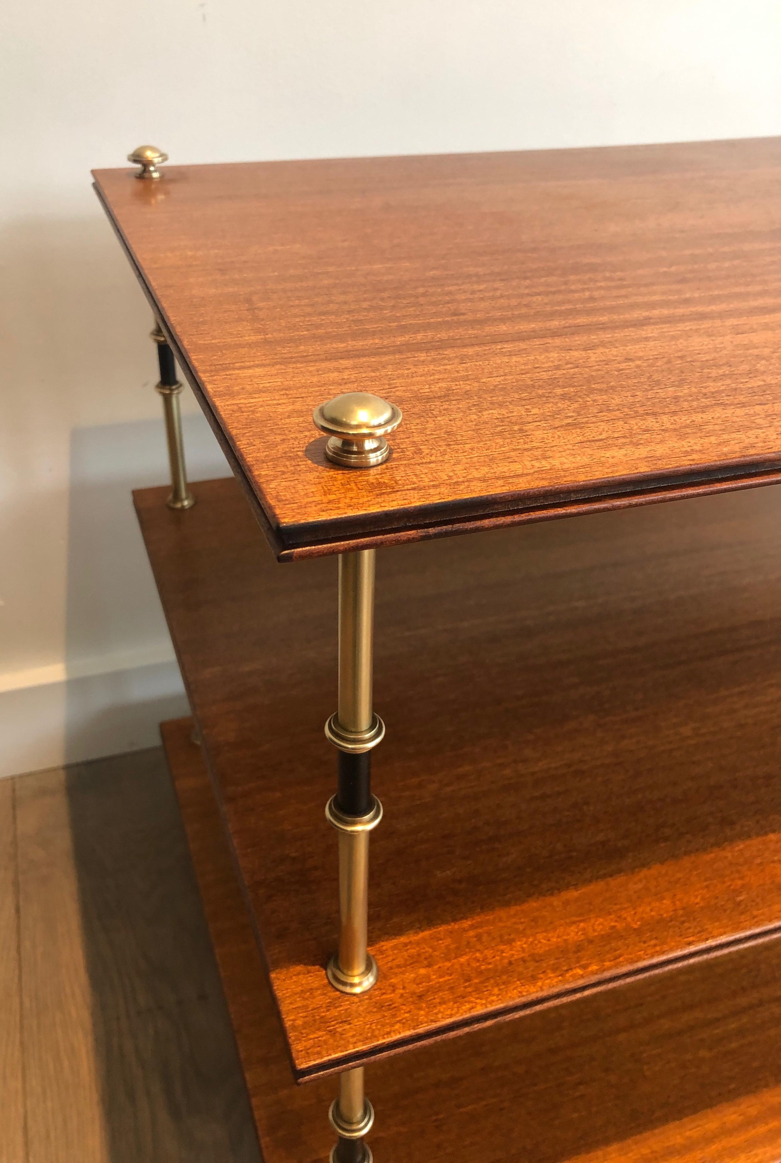 Brass Pair of mahogany and brass three tiers console or side tables by Maison Jansen For Sale