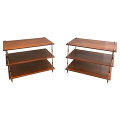 Pair of mahogany and brass three tiers console or side tables, Maison Jansen