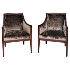 Pair of mahogany and velvet armchairs, 1940s