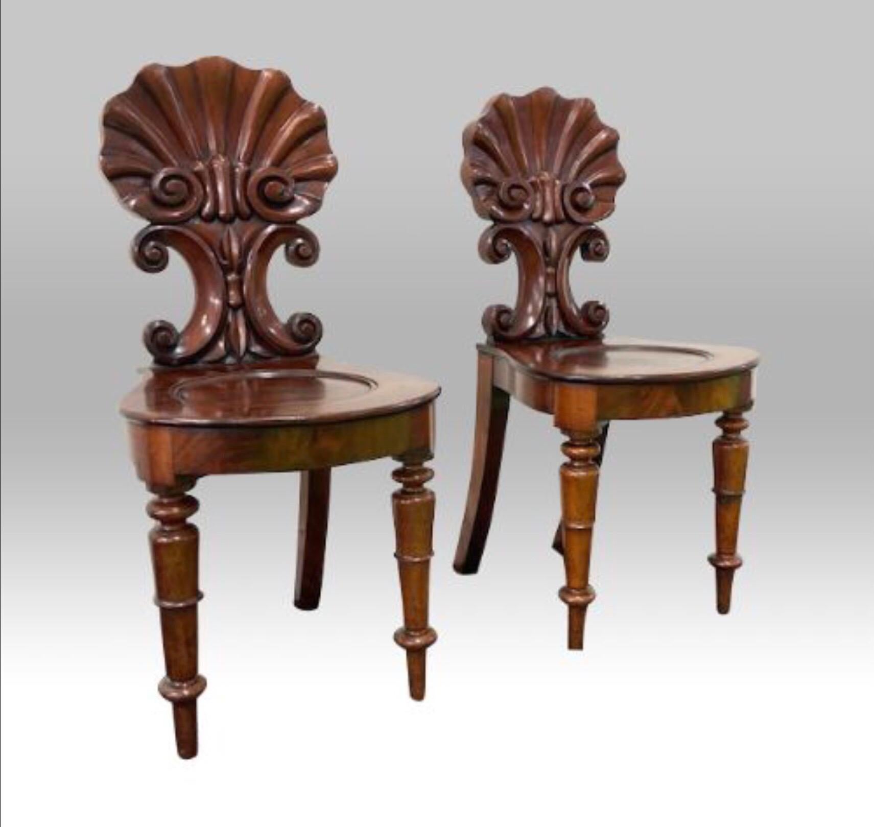 Fabulous pair of quality mahogany escalloped backed antique coaching hall chairs.
After Gillows.
C1840
Measures: 32ins x 15ins x 15ins
81.5cm x 38cm x 38cm.