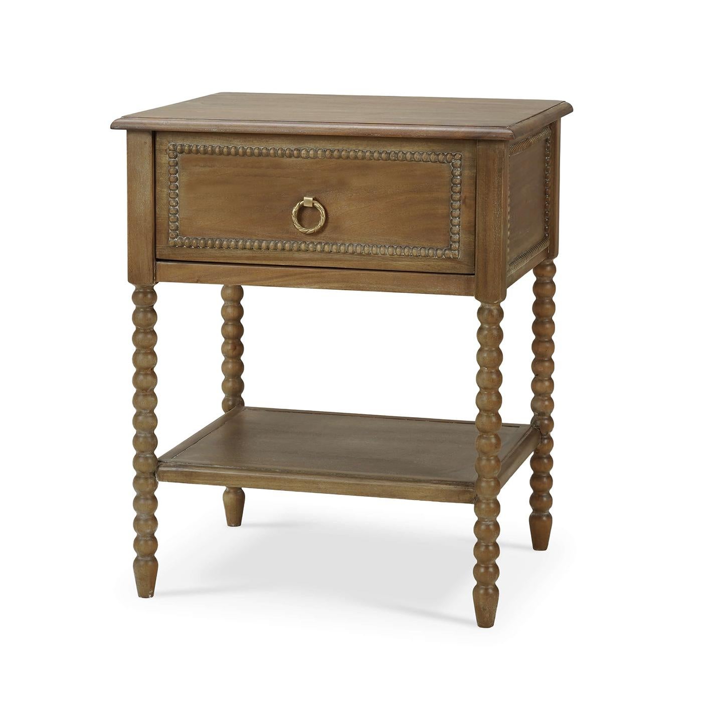 (A newly made reproduction)

This beautifully crafted piece features a lightly distressed straw wash finish that complements any decor style. The delicate ring pulls add a hint of sophistication, making this table a perfect addition to both